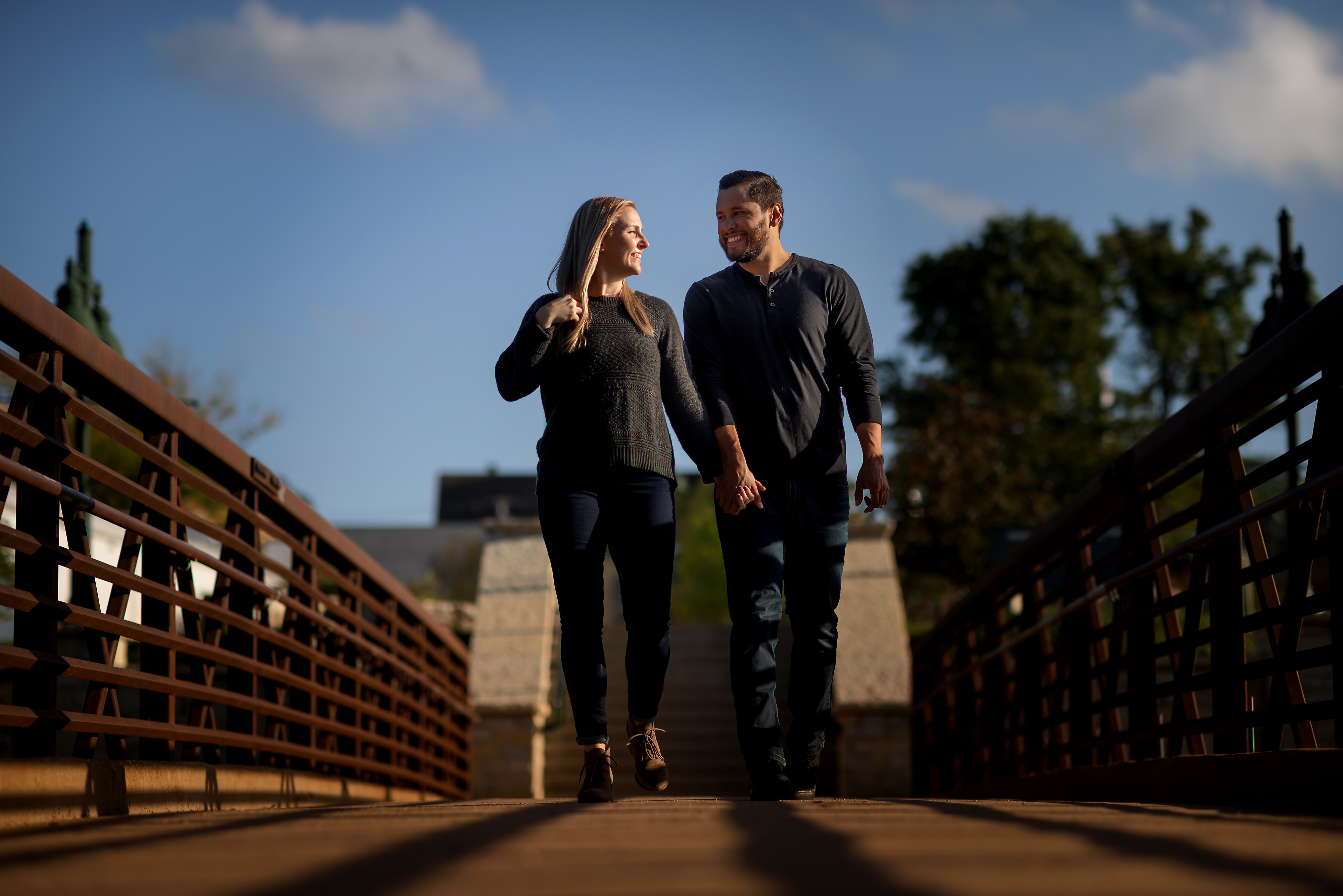 Couple poses for engagement photos in downtown Lemont Illinois