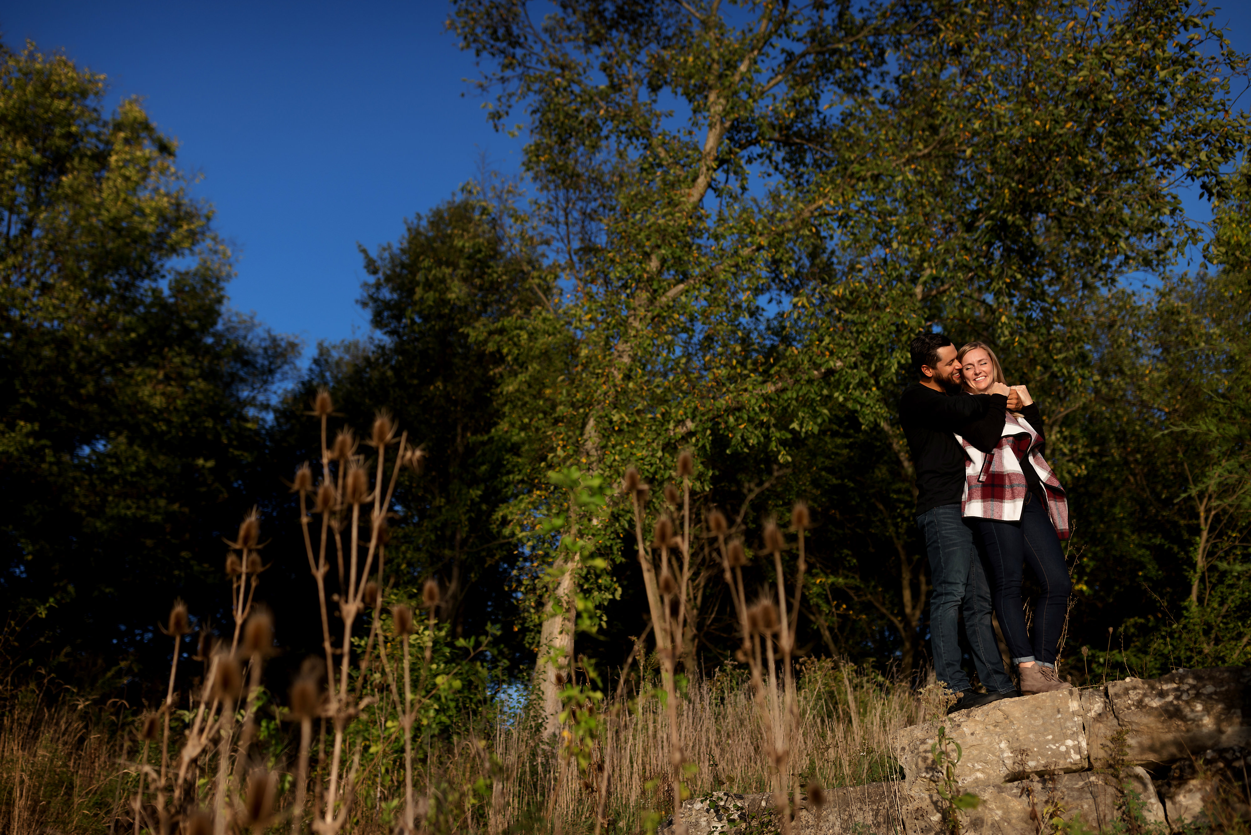 Couple poses for engagement photos at Lemont Heritage Quarries Recreation Area