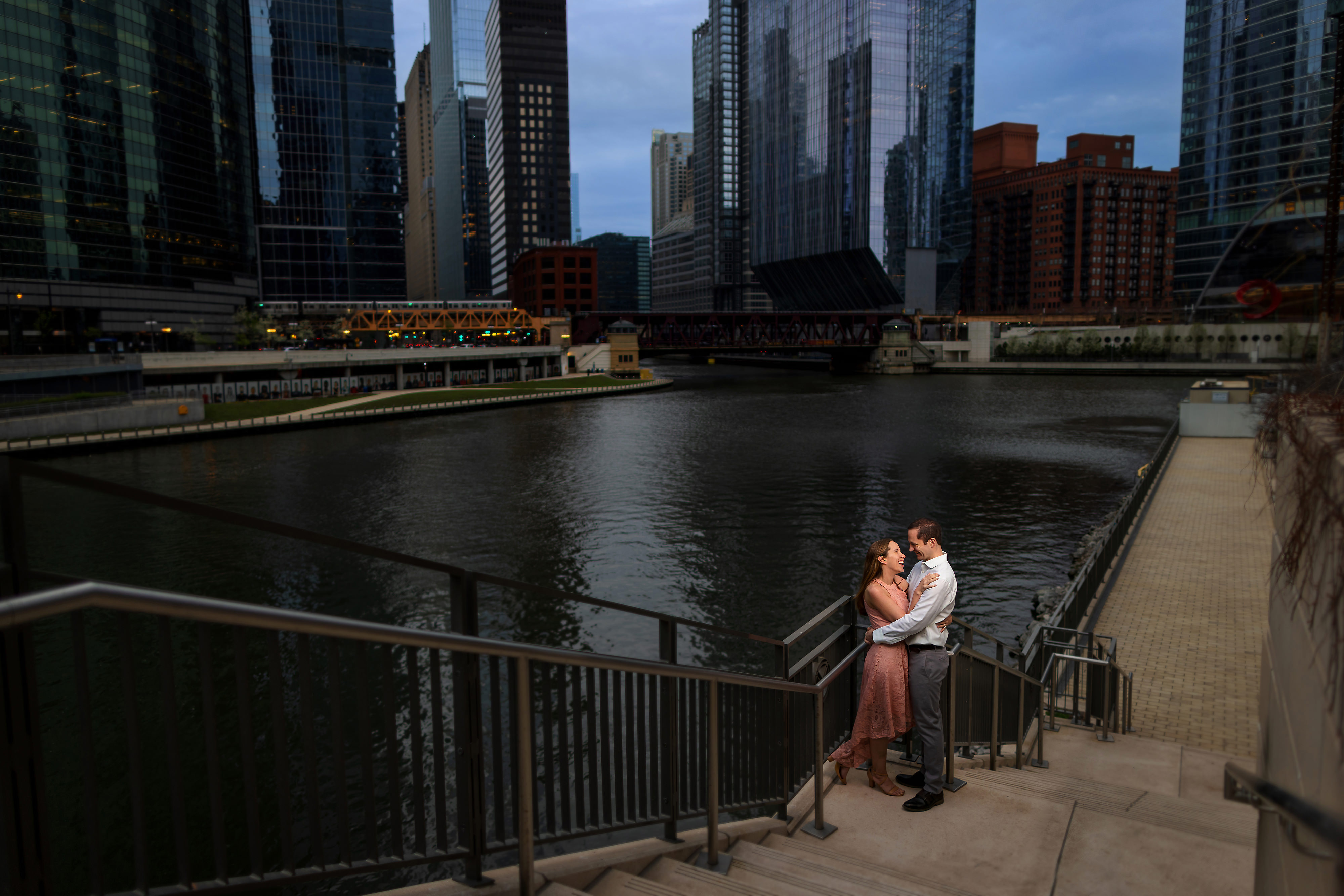 Wedding couple poses for engagement photos near Gibson's Italia and Wolf Point
