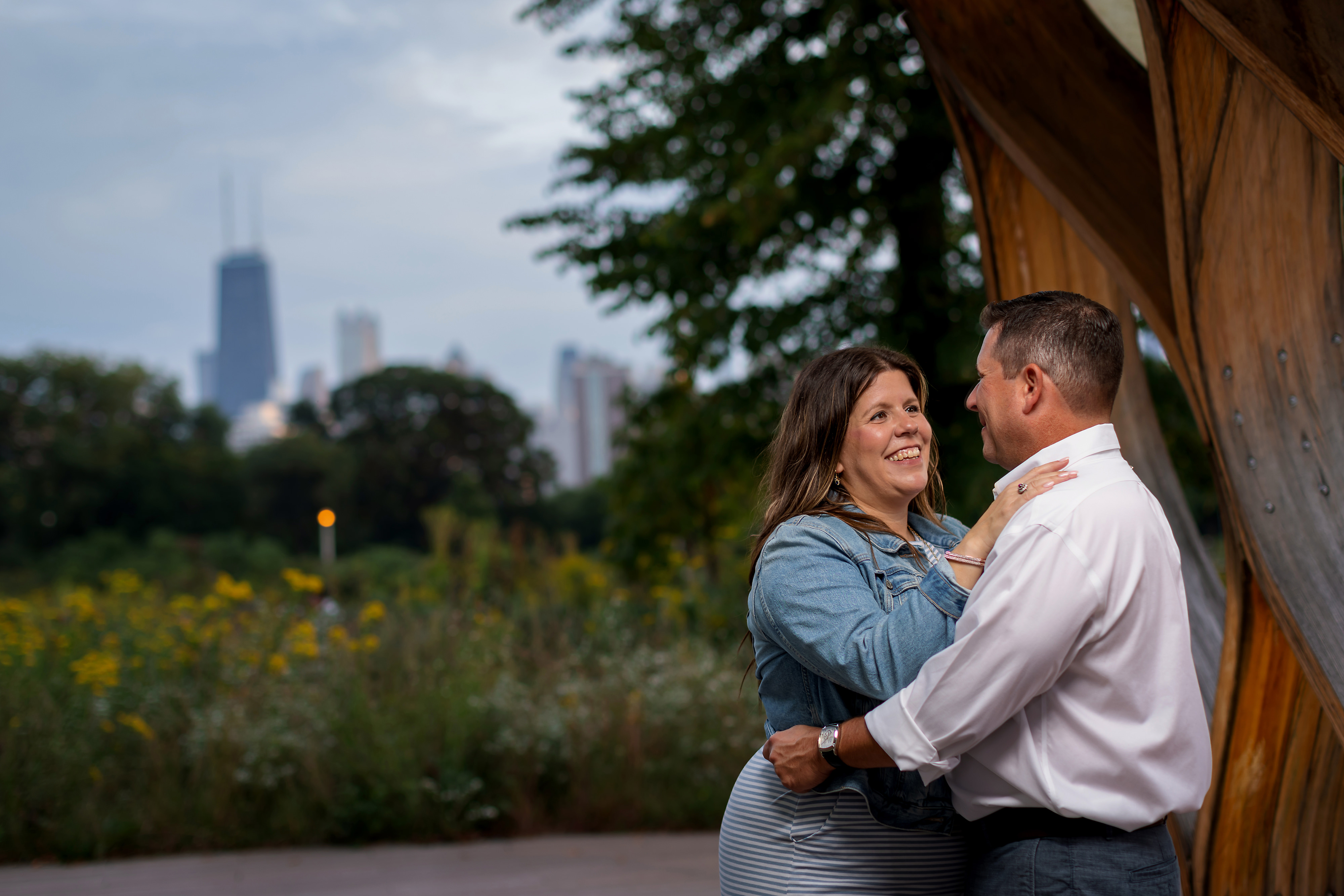 bride and groom pose for portraits during engagement session in Lincoln Park