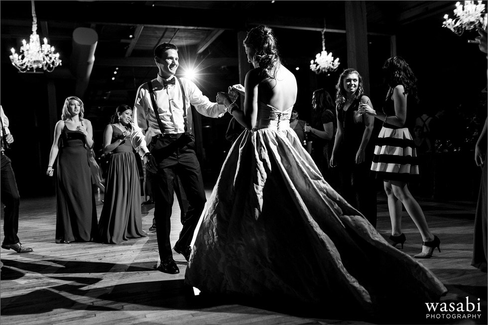 black and white bride and groom backlit dancing photo at Bridgeport Art Center