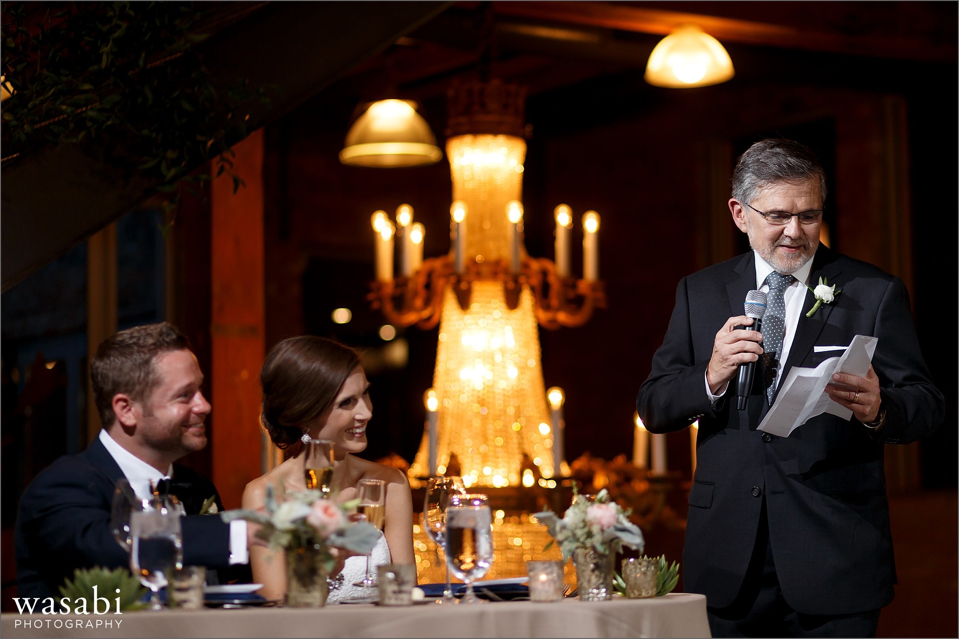 toasts during reception at architectural artifacts wedding