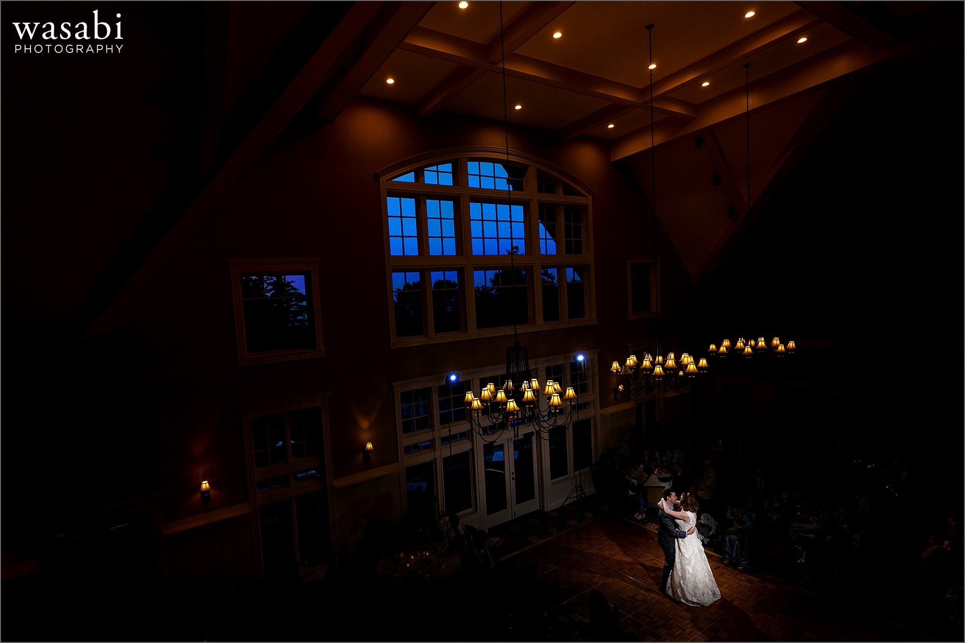 wide angle picture showing entire room during first dance at Oakhurst Country Club wedding in Clarkston, Michigan