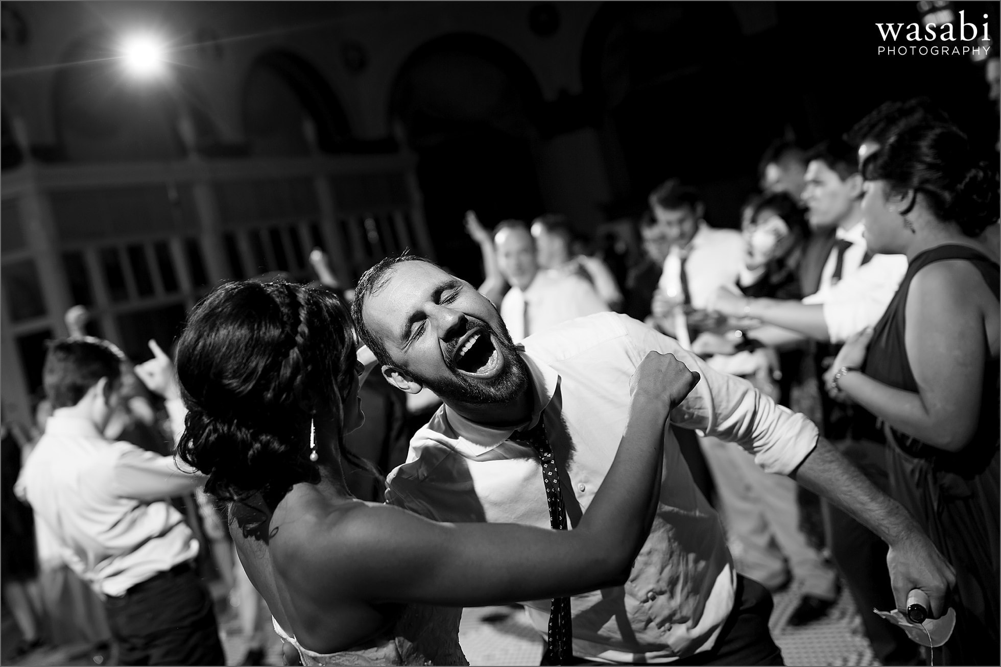 guests dance during South Shore Cultural Center wedding reception