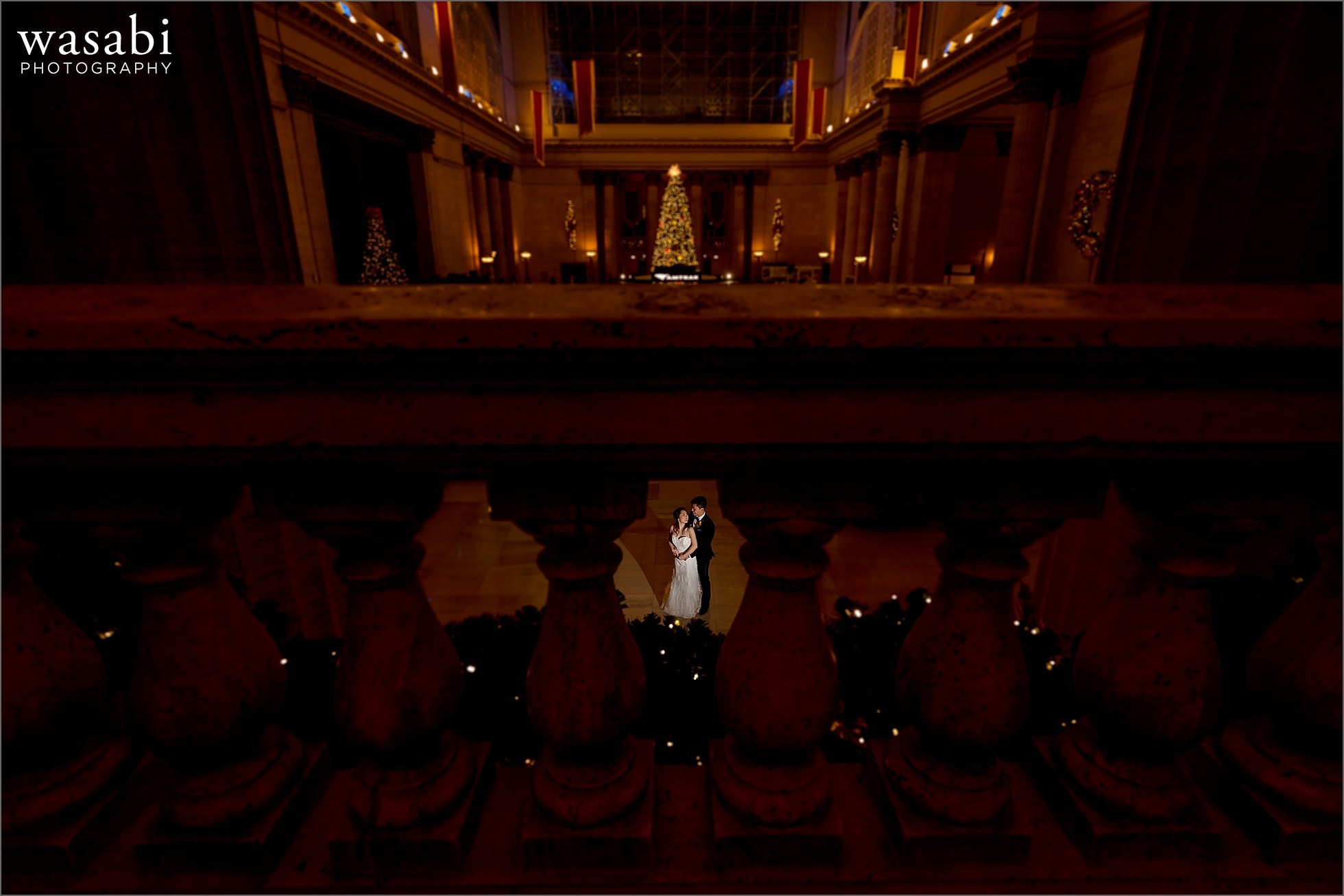 indoor lit portrait of bride and groom at Union Station in Chicago