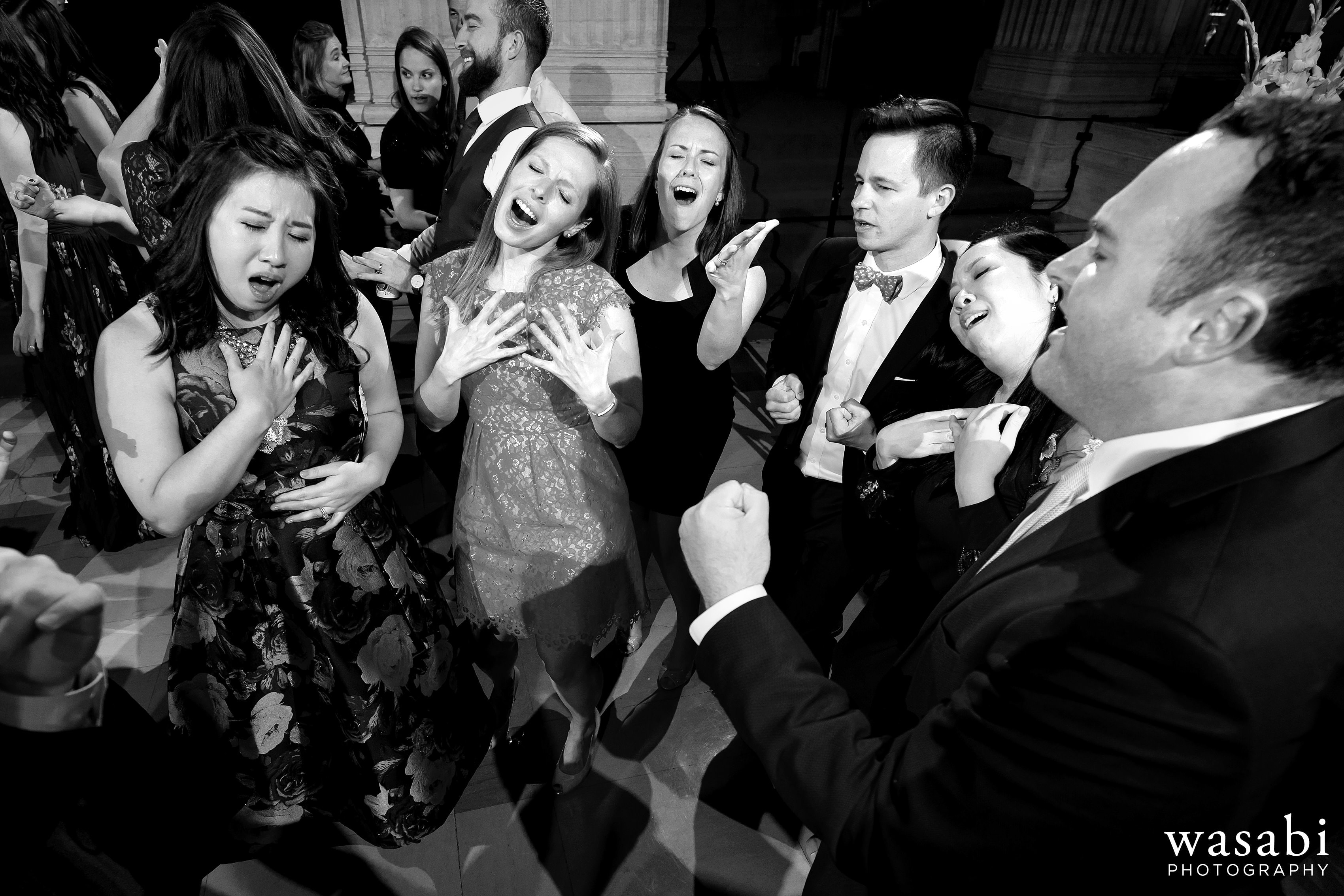 Guests dance during Civic Opera House wedding reception