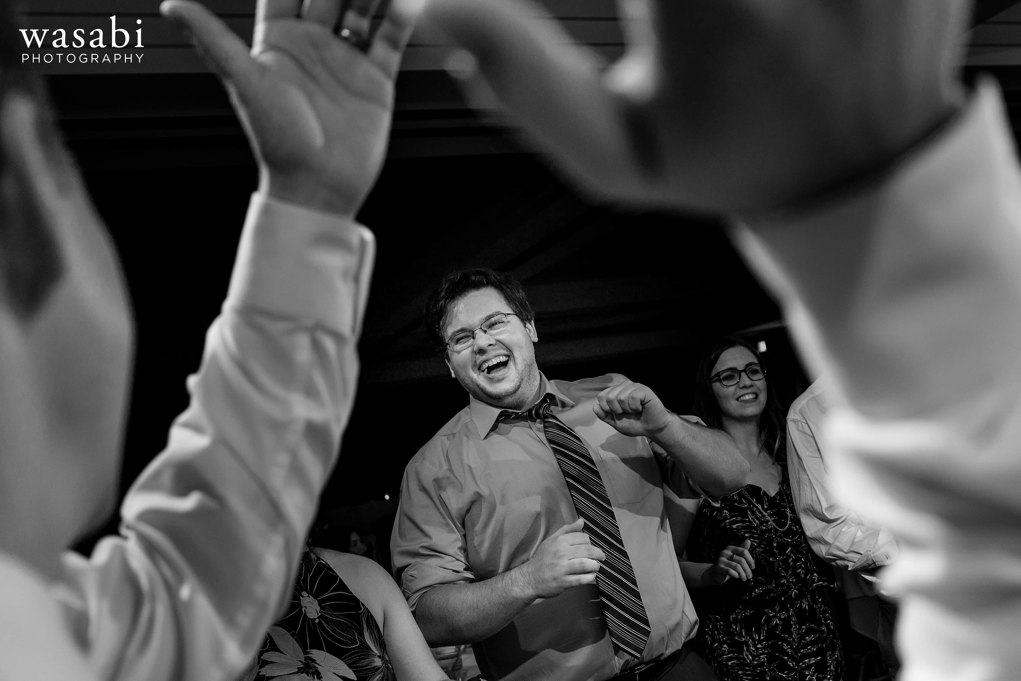 guests dance during a Eberhard Center wedding reception