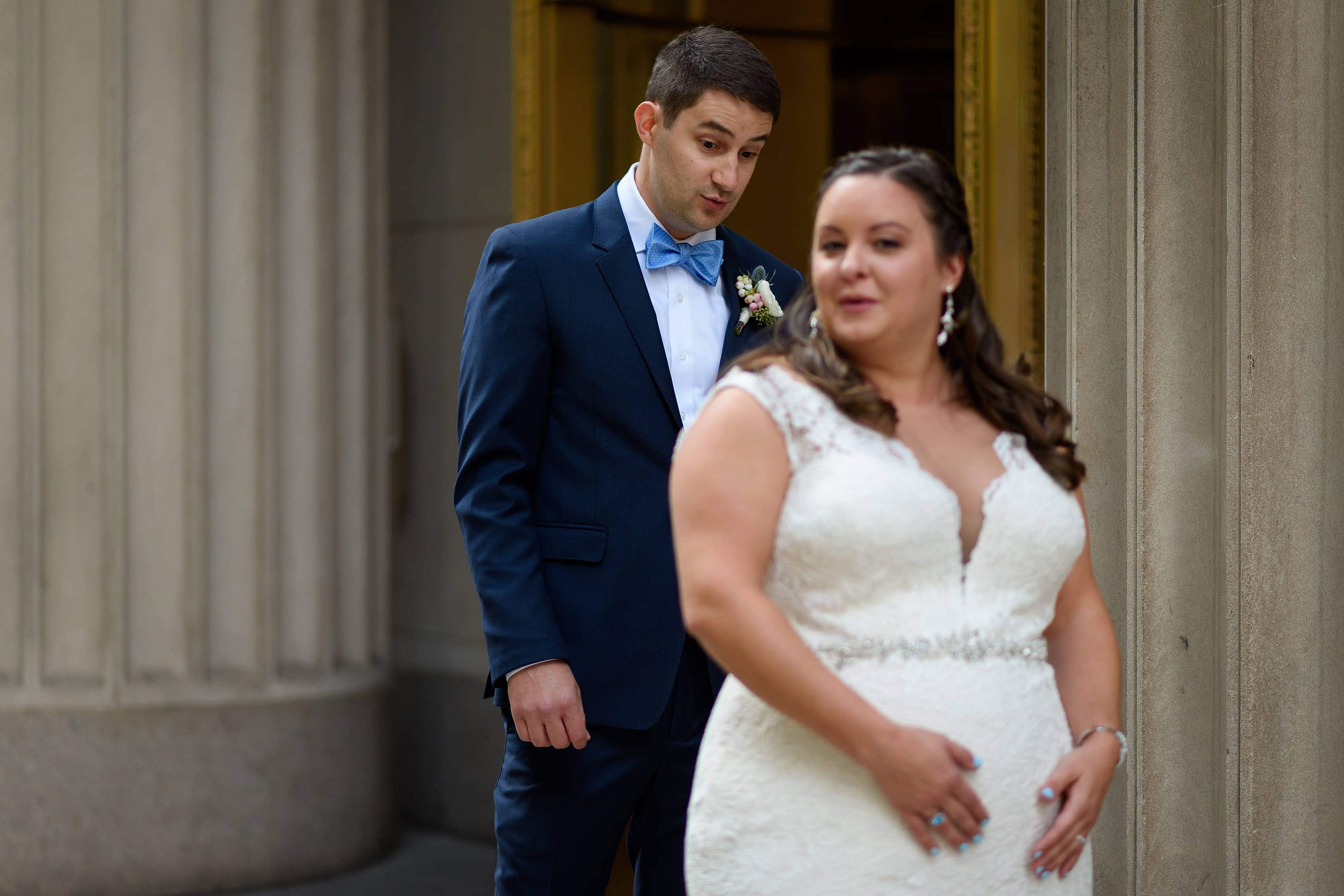 bride and groom first look on LaSalle street in downtown Chicago