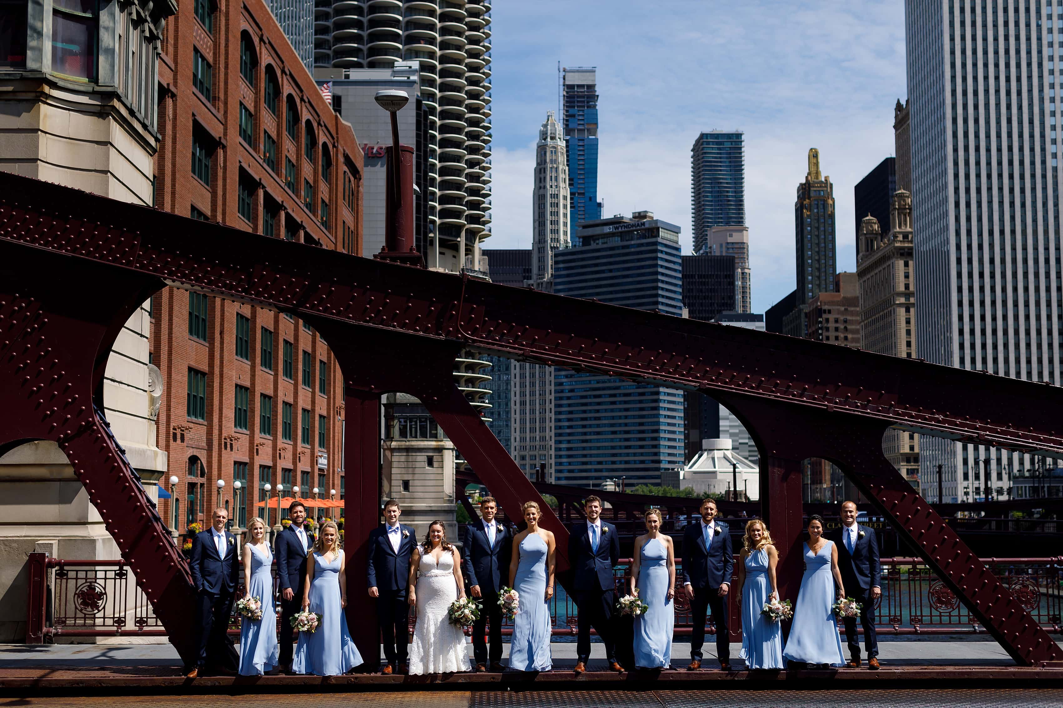 wedding party portrait on LaSalle street bridge in downtown Chicago