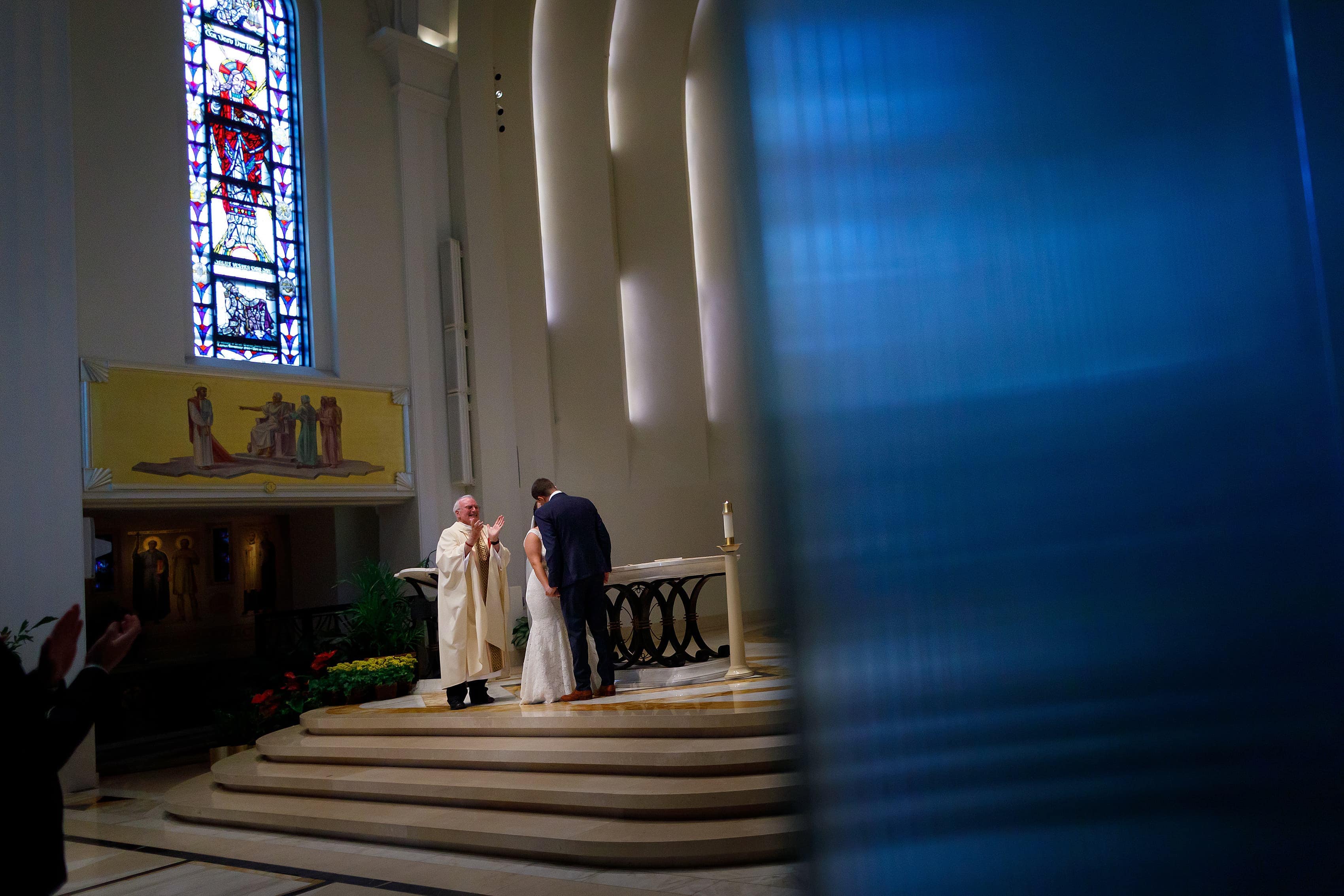 wedding ceremony at Madonna Della Strada Chapel on Loyola University campus