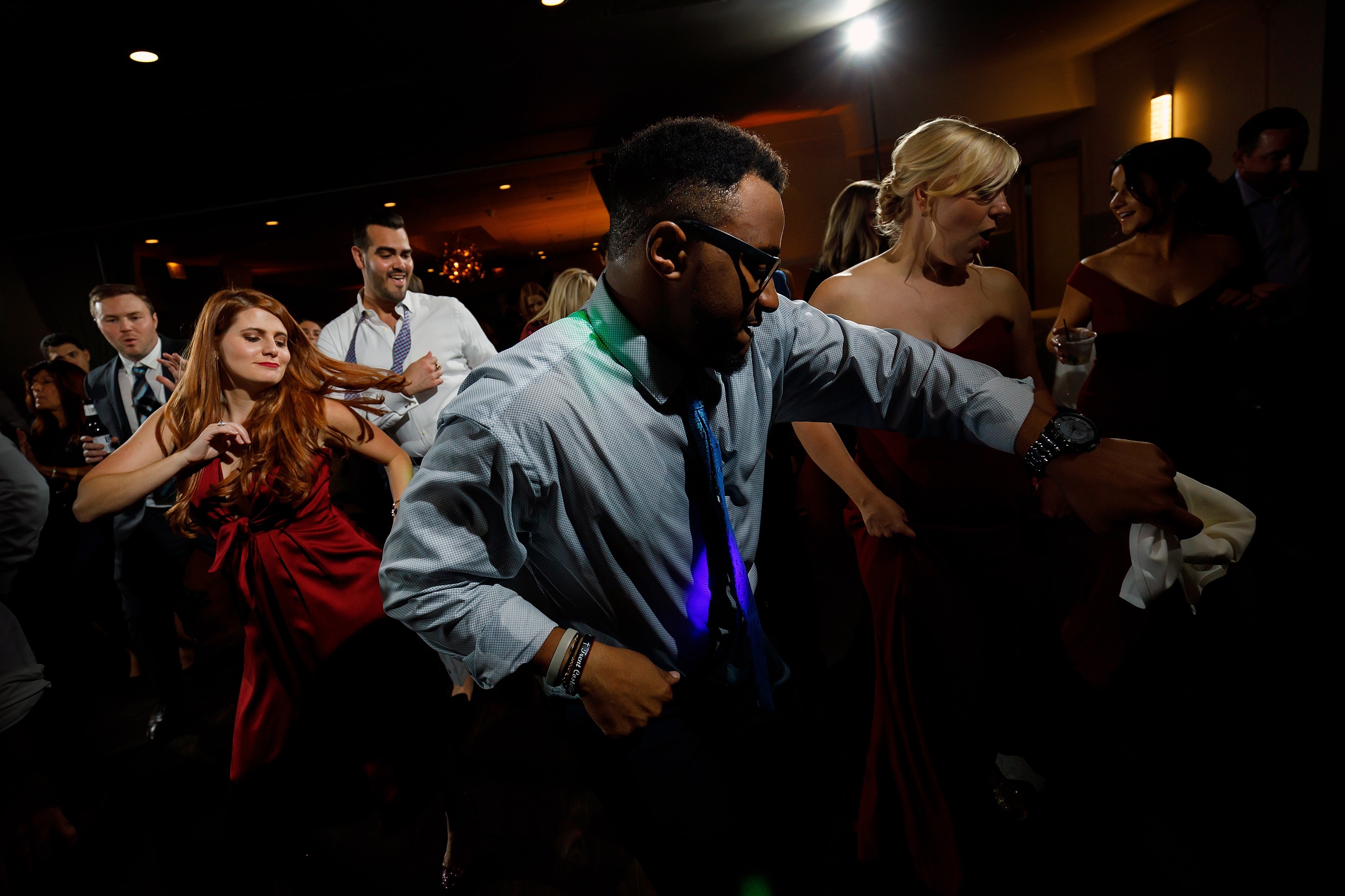 wedding guests dance during wedding reception at Pazzo's at Three-Eleven in downtown Chicago
