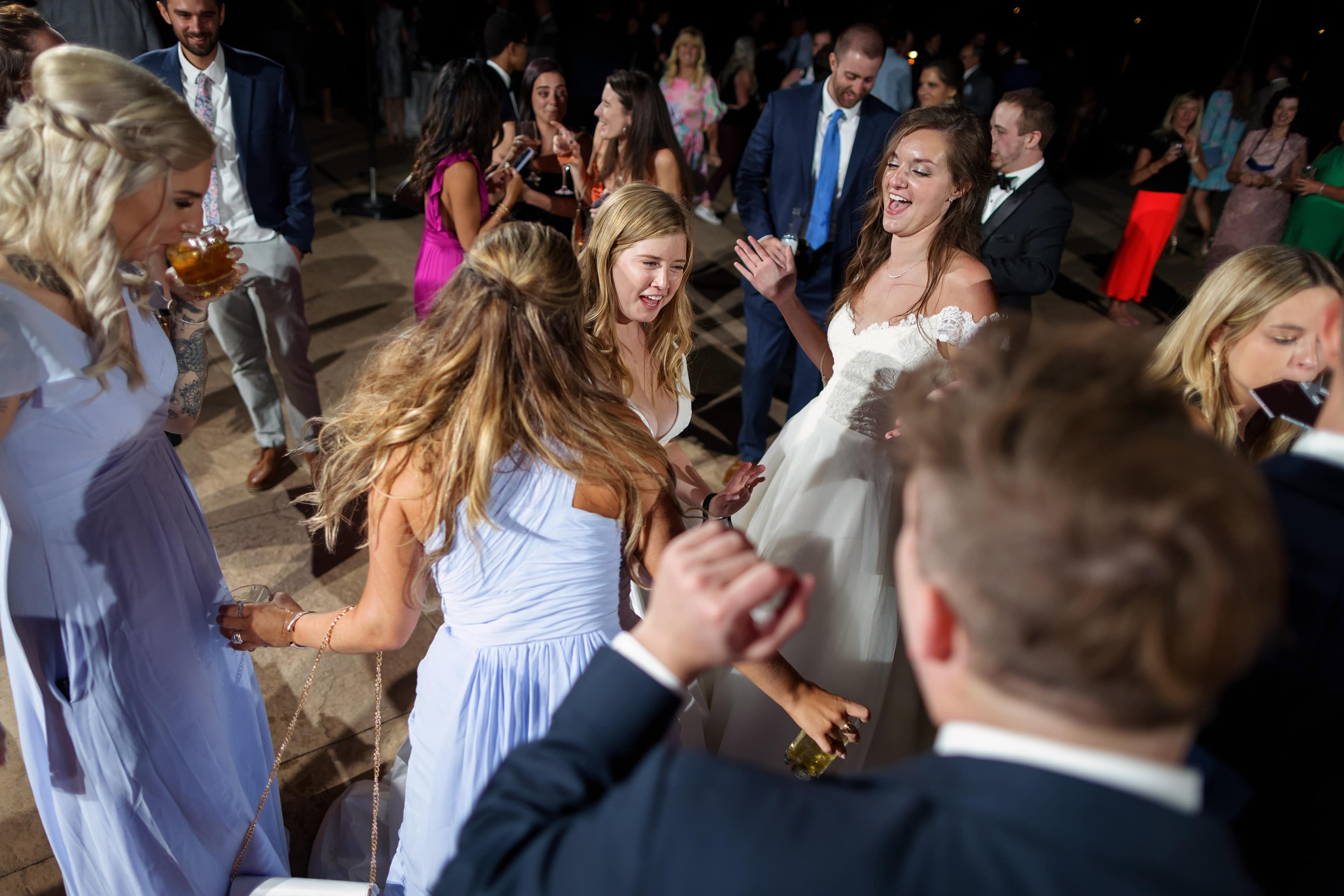 wedding guests dance during reception at The Broadmoor Hotel 