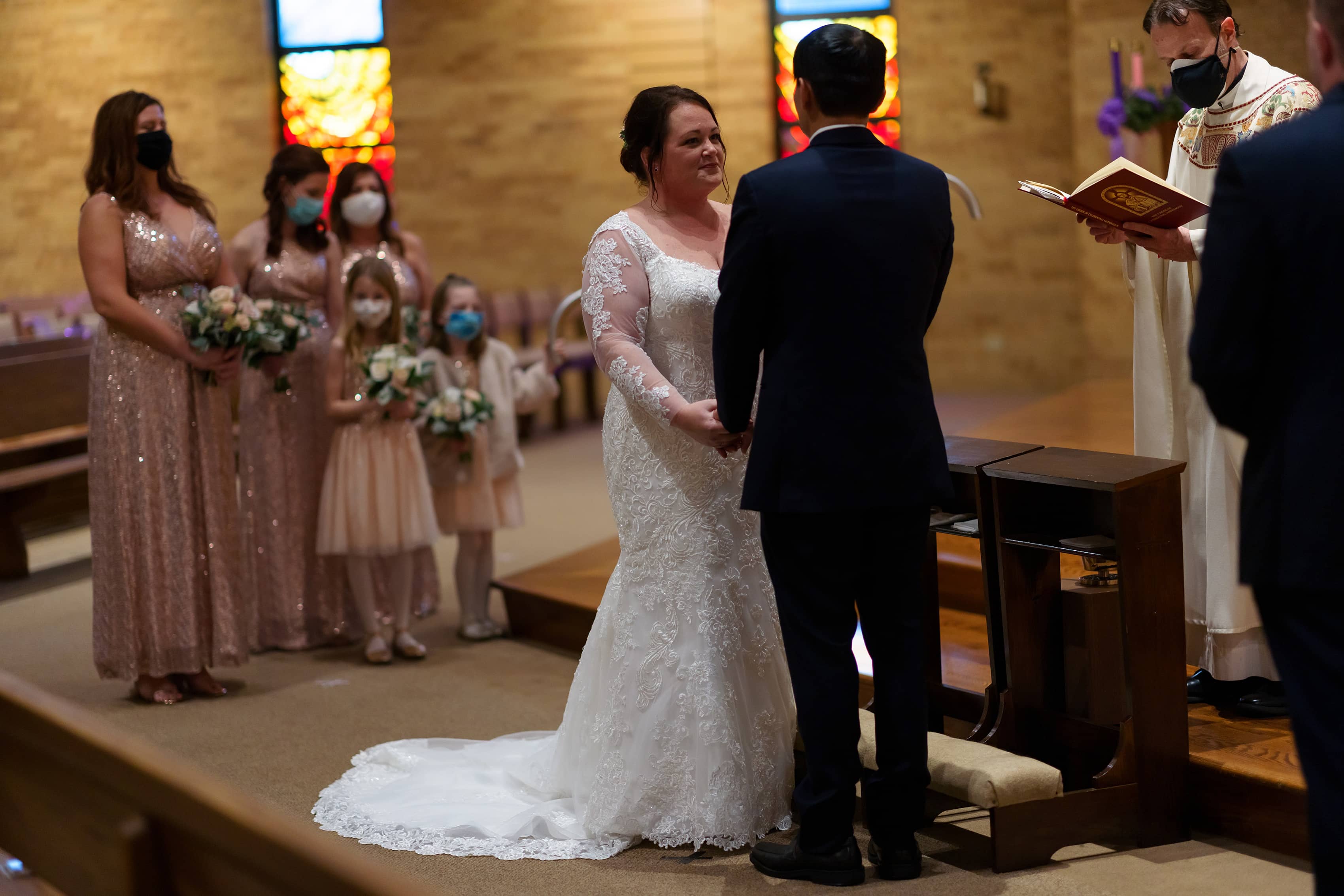 bride and groom are married at St. Scholastica parish