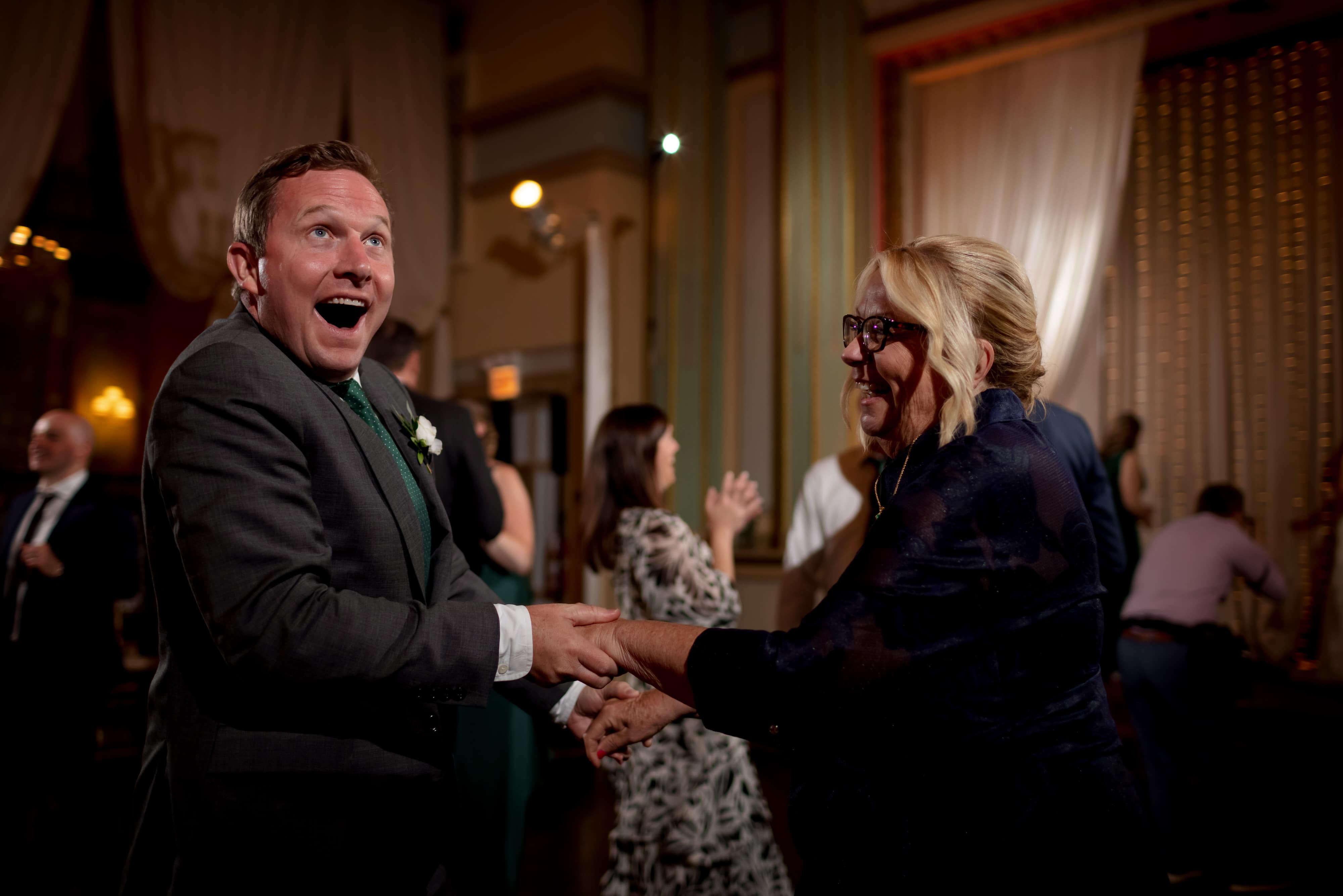 guests dance during wedding reception at Stan Mansion in Chicago