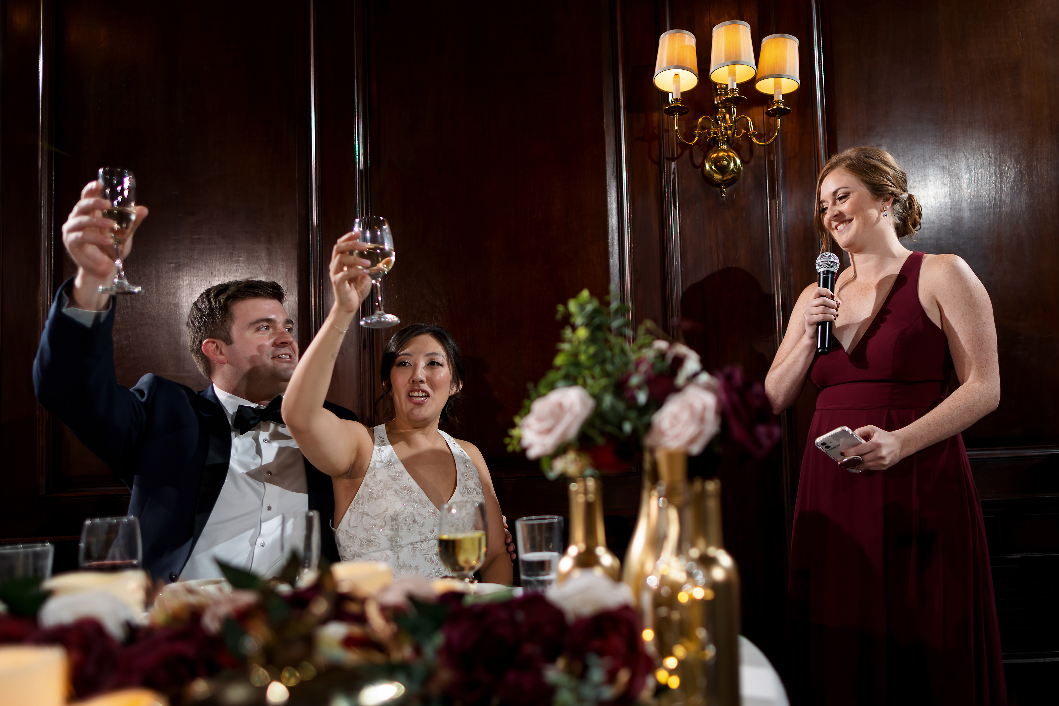 sister gives toast during wedding reception at Salvatore's