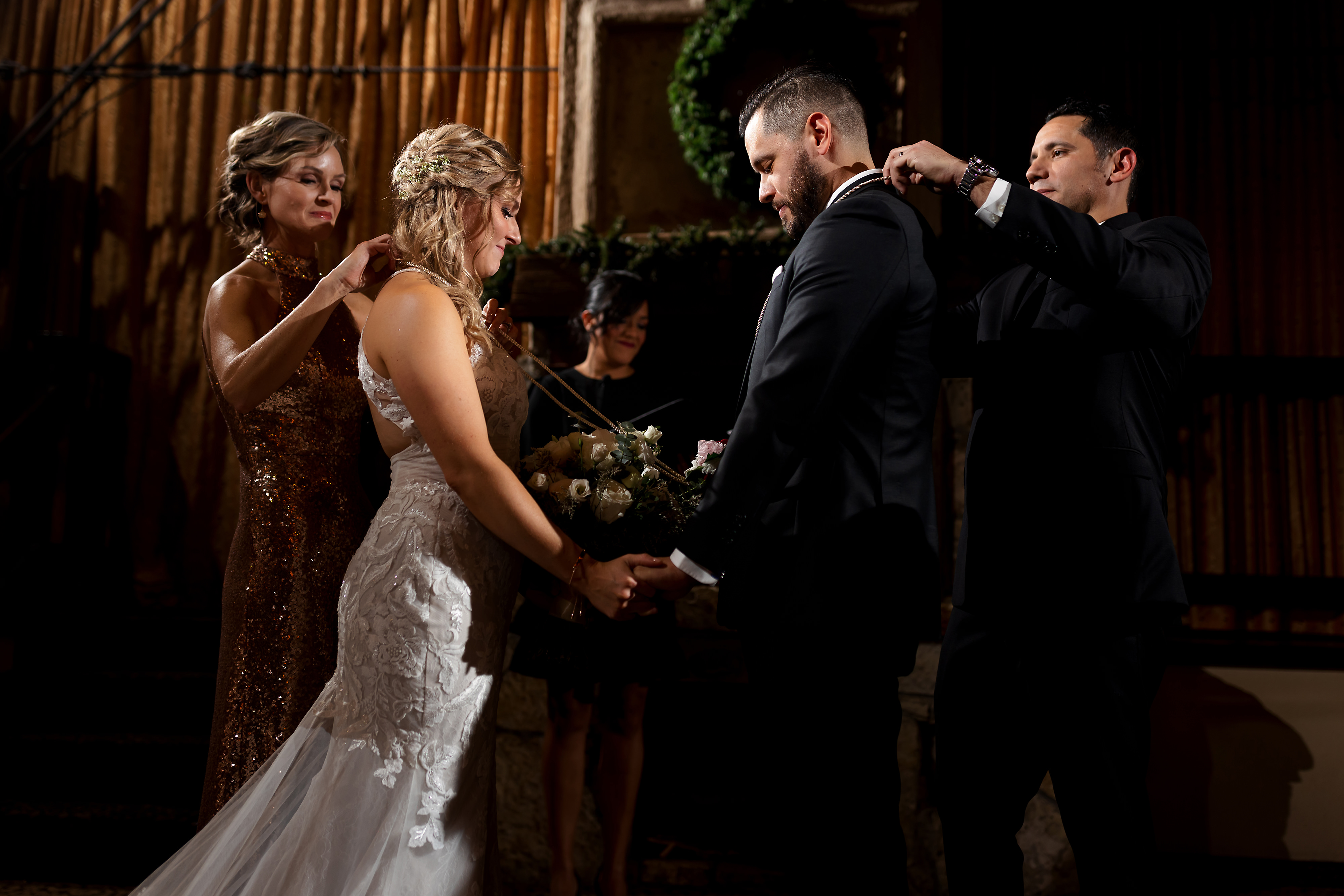 Wedding lasso exchange during wedding ceremony at Two Brothers Brewing in Aurora, Illinois