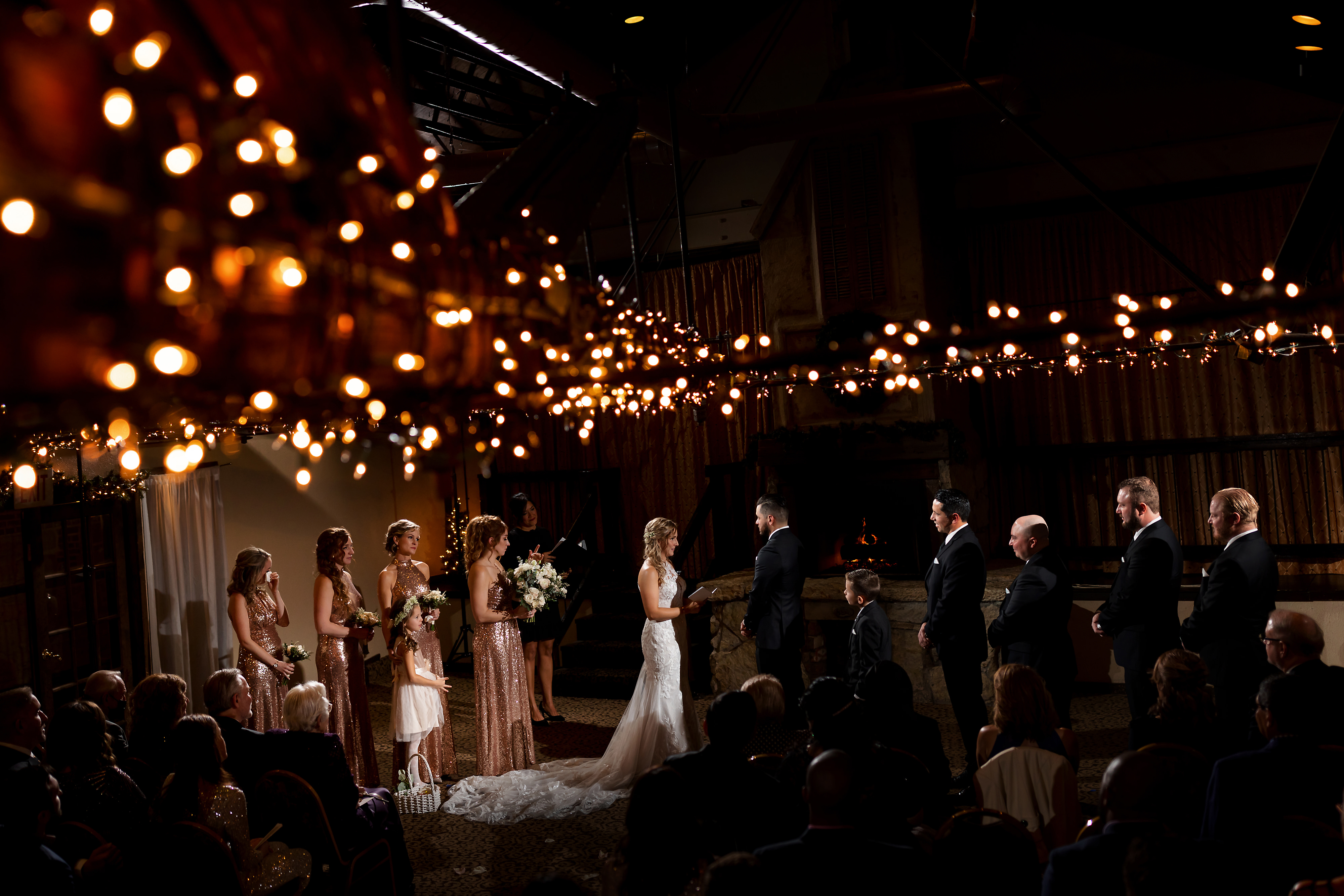 Wide angle view of winter wedding ceremony at Two Brothers Brewing in Aurora, Illinois