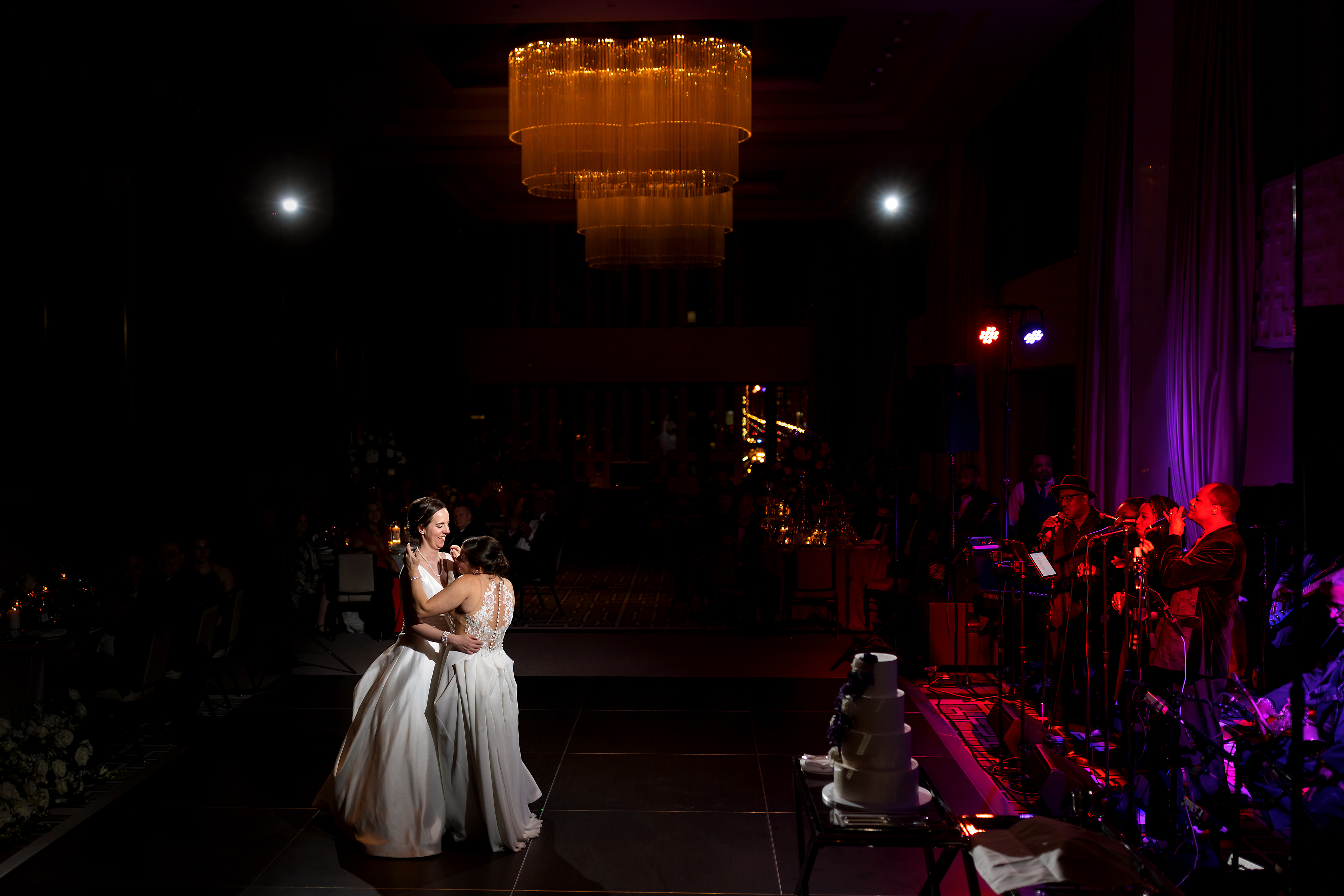 Brides share first dance during wedding reception at The Langham Hotel in downtown Chicago