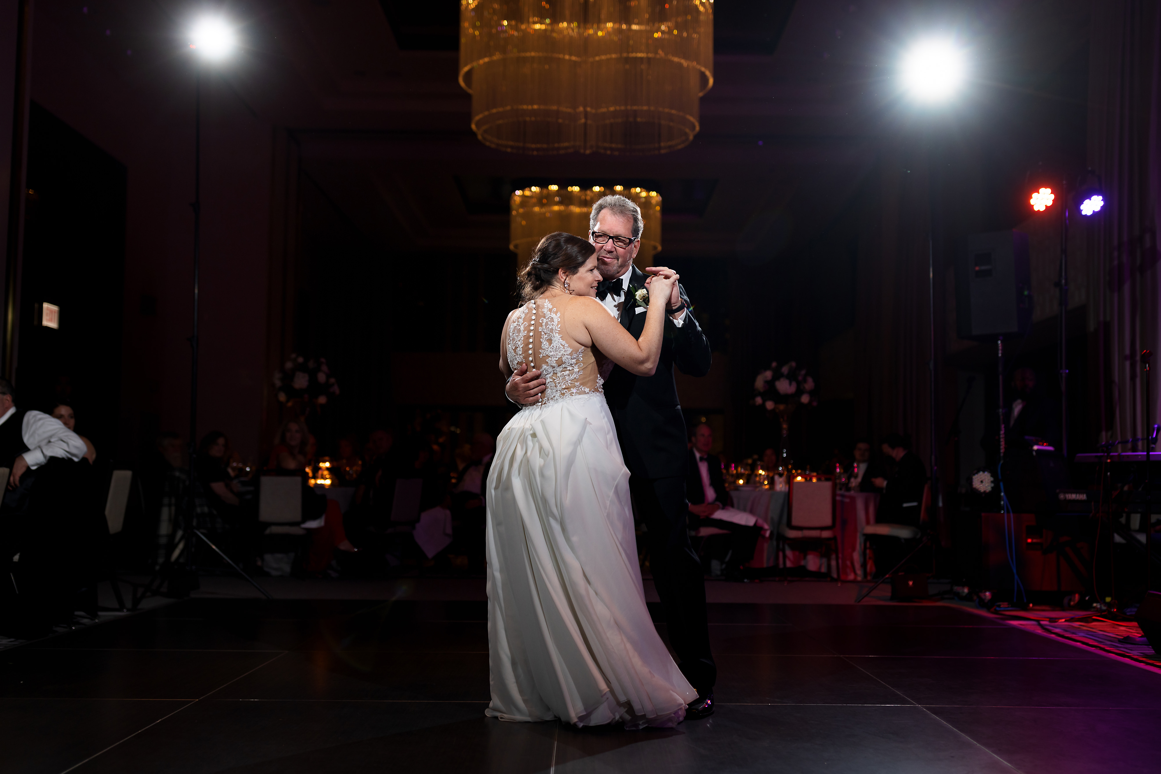Bride and father share first dance during wedding reception at The Langham Hotel in downtown Chicago