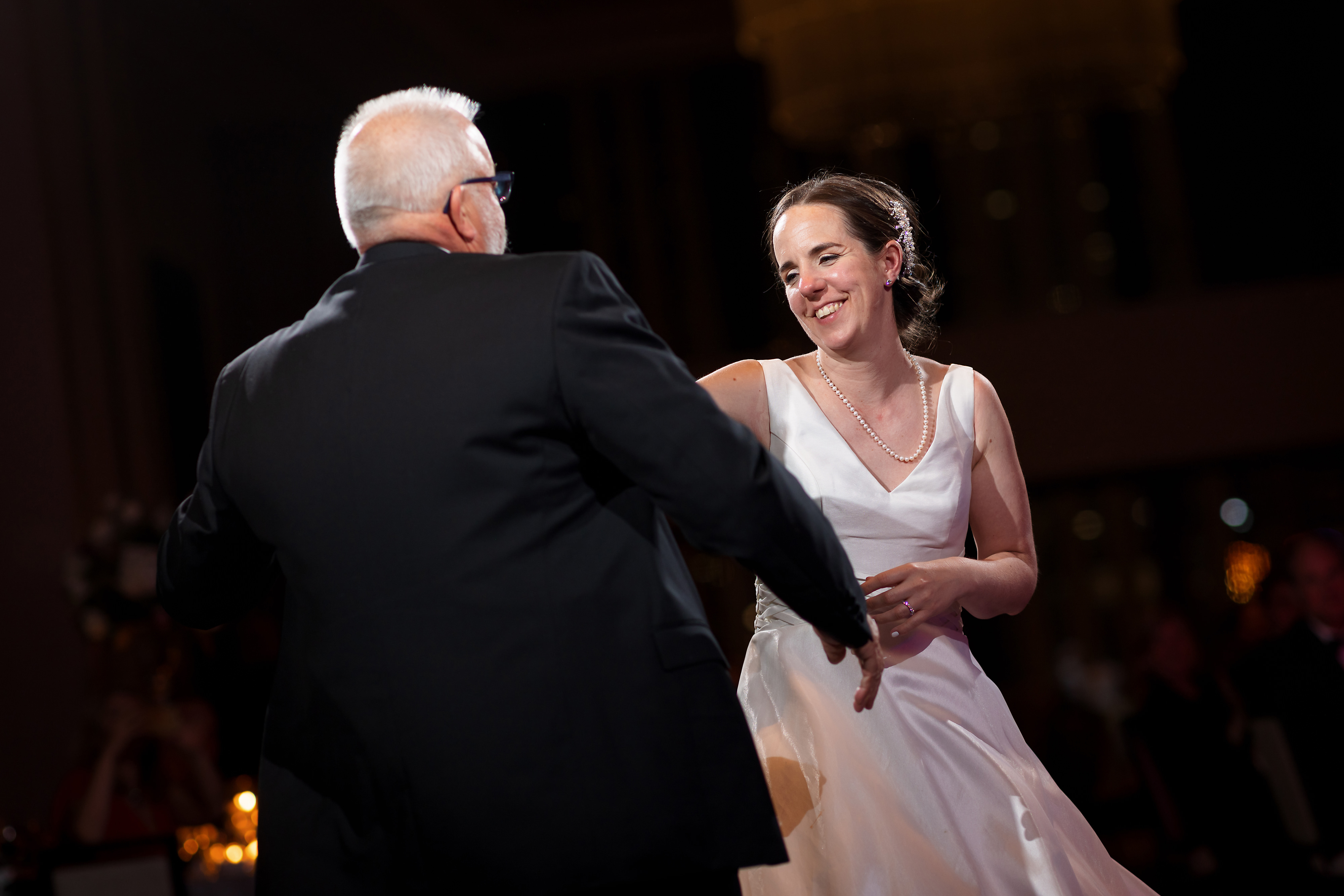 Bride and father share first dance during wedding reception at The Langham Hotel in downtown Chicago