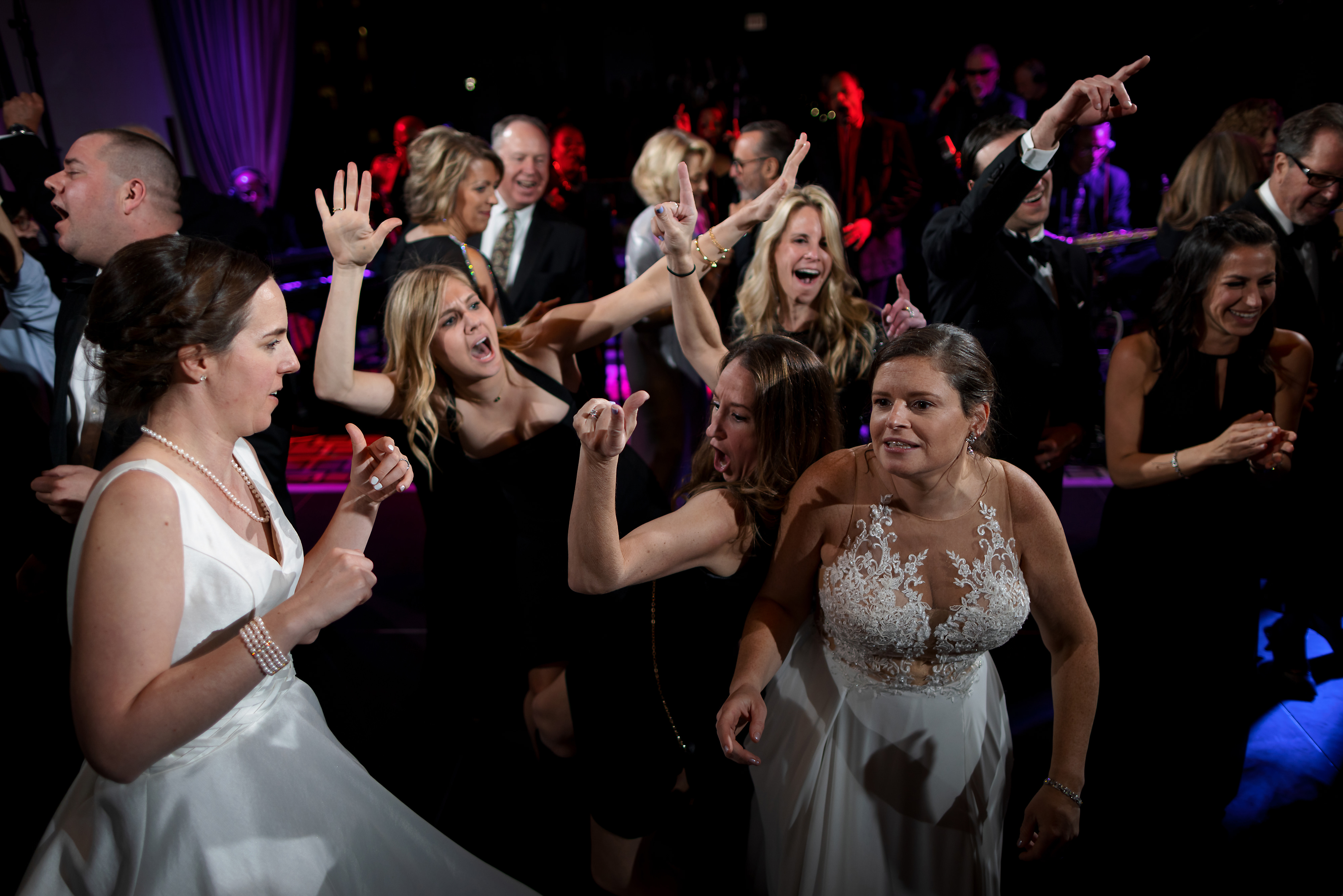 Wedding guests dance during wedding reception at The Langham Hotel in downtown Chicago