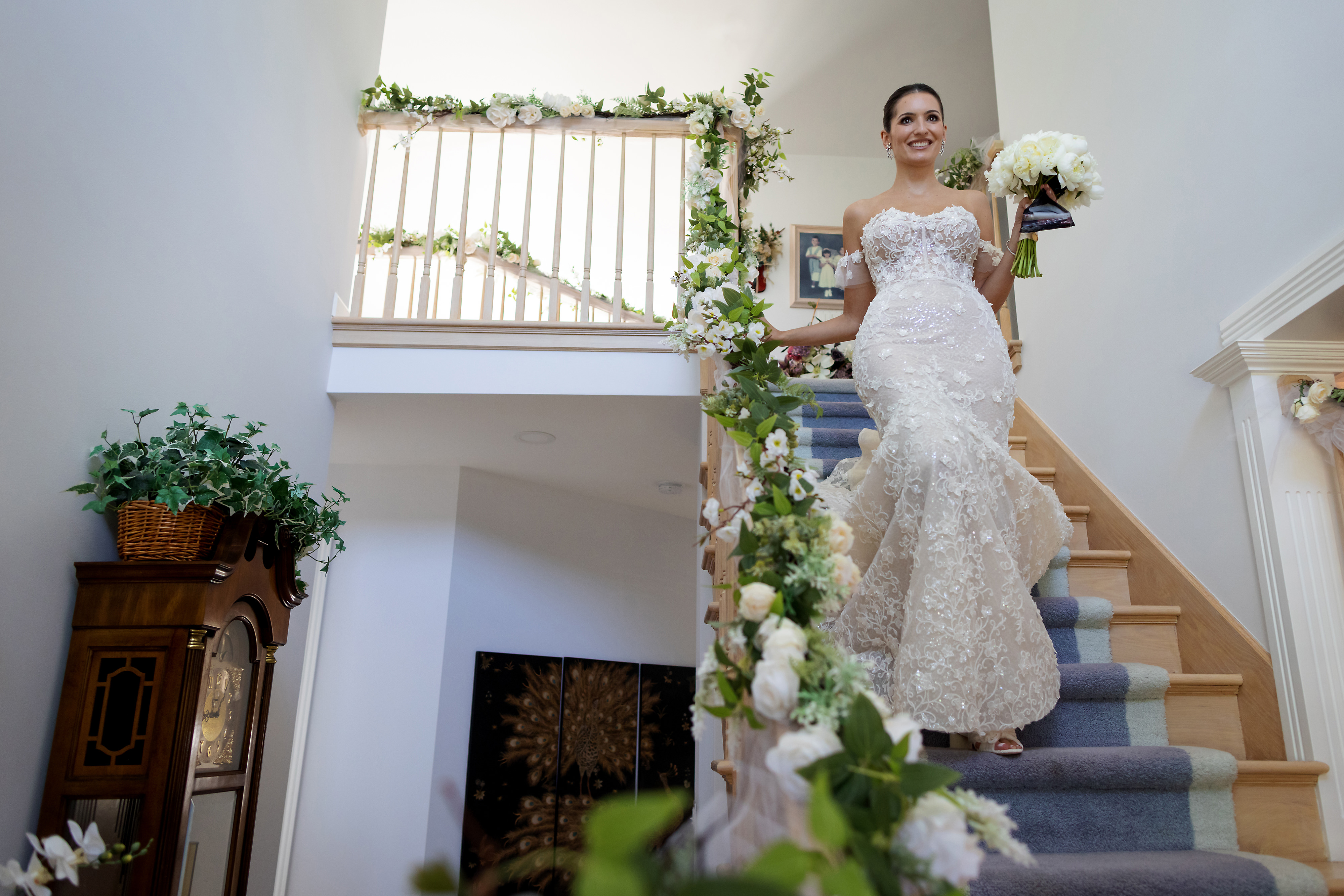 Bride walks down stairs during Serbian Orthodox wedding Skup