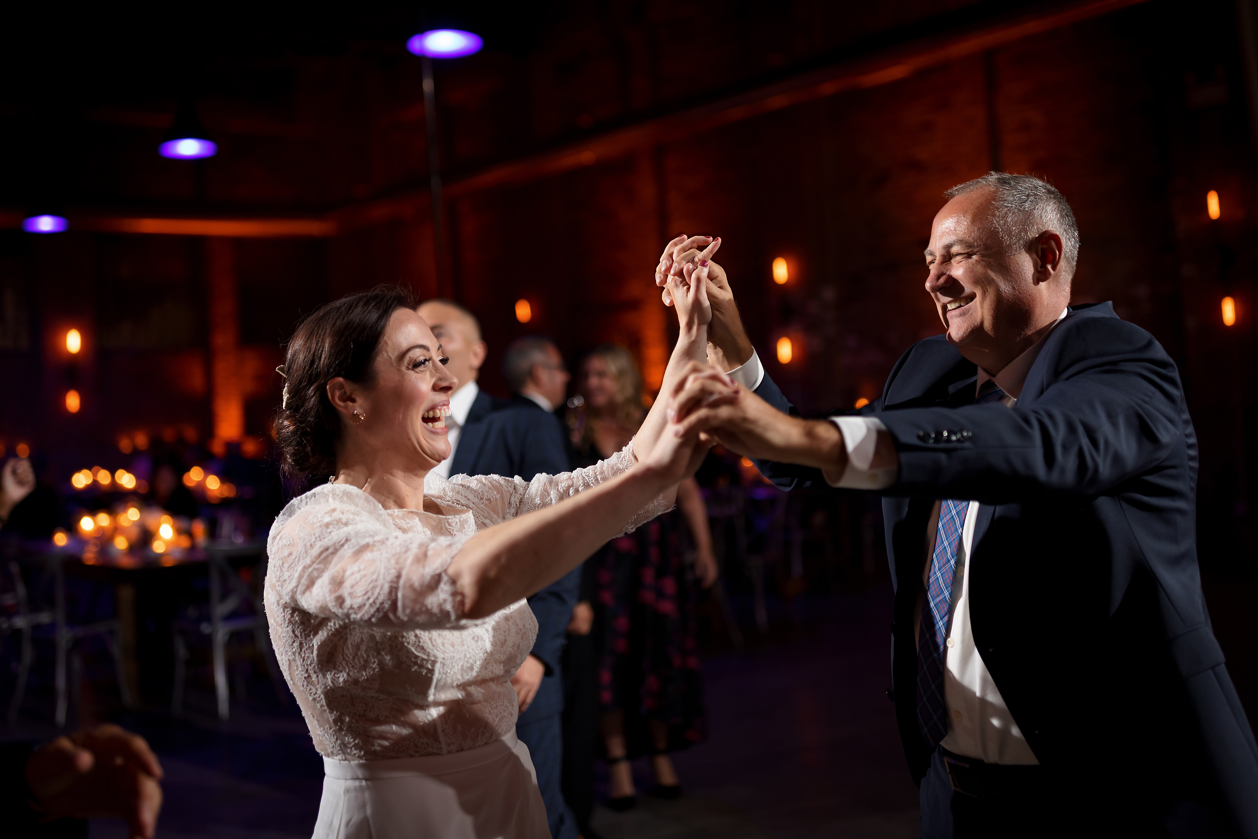 wedding guests dance during reception at The Fairlie