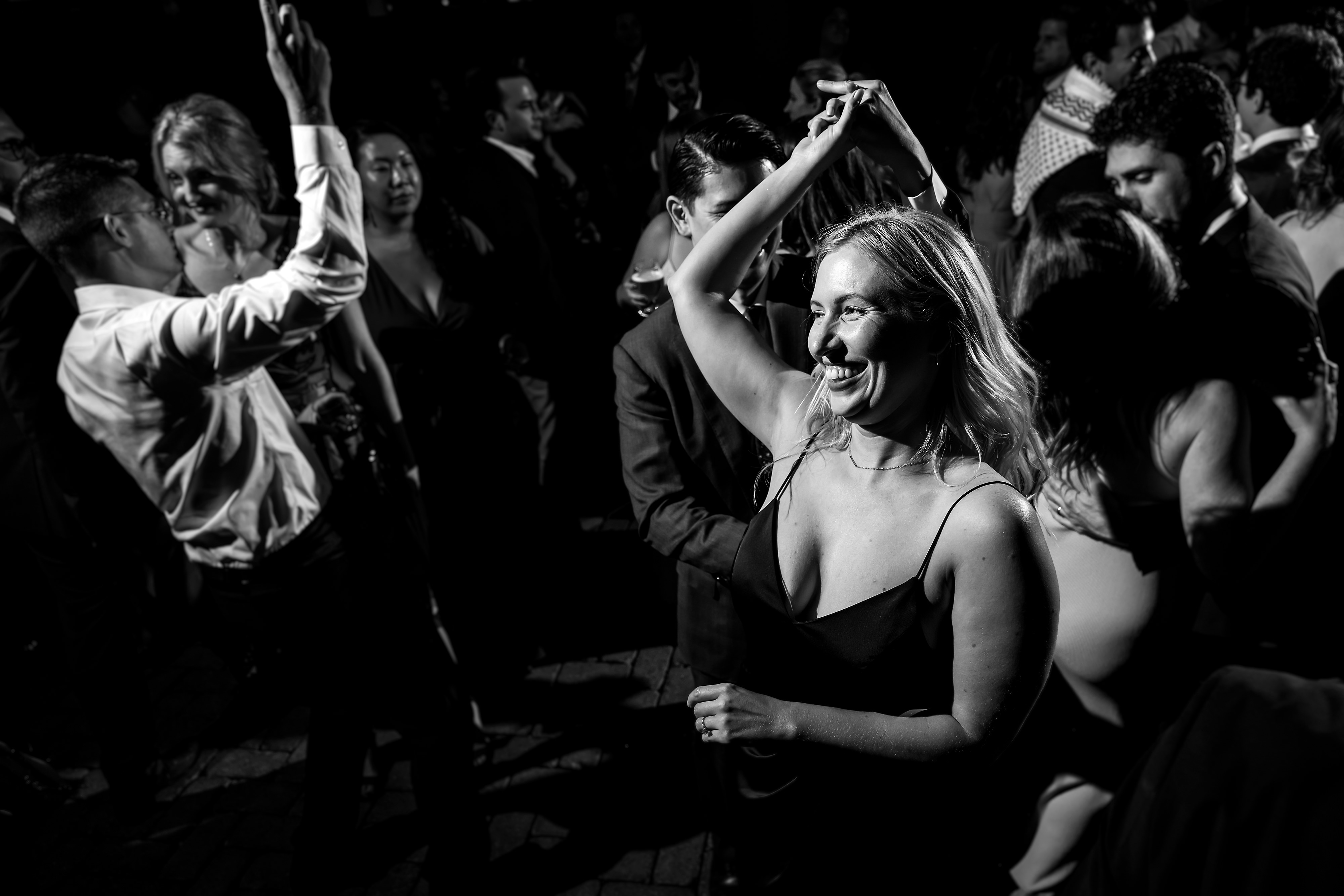guests dance during outdoor wedding reception at The Dawson restaurant in downtown Chicago