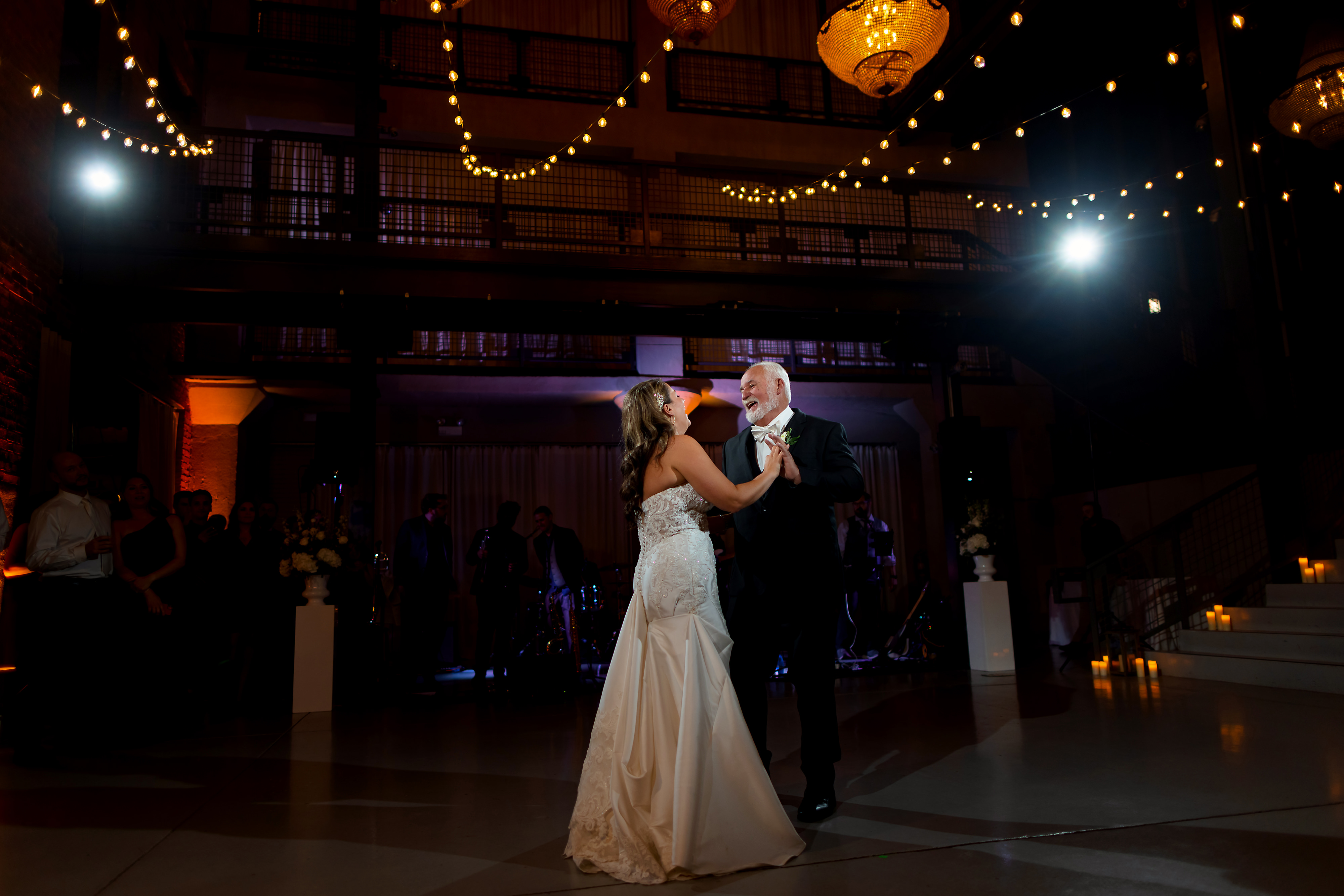 Bride dances with father during wedding reception at Artifact Events in Chicago.