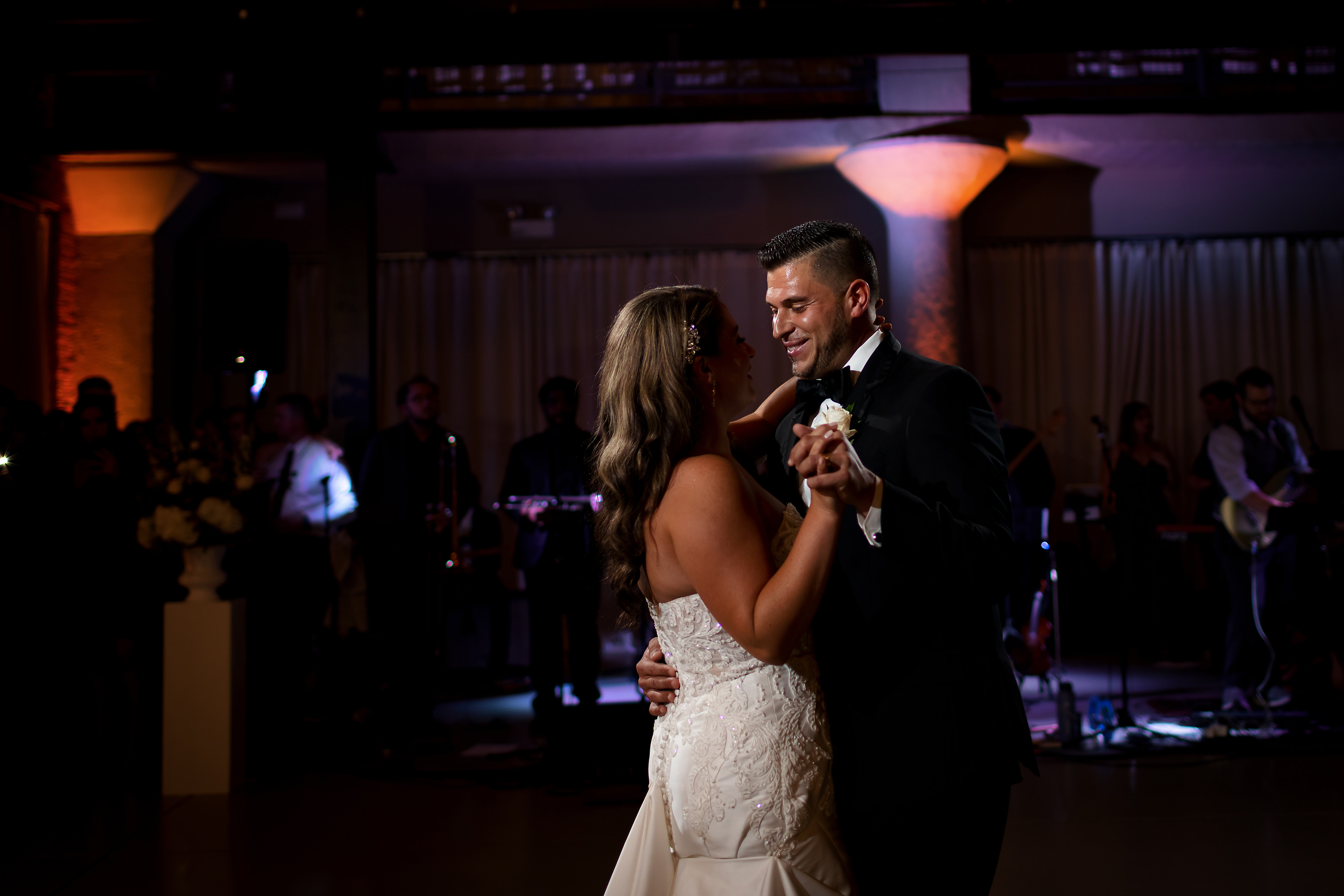 Bride and groom share first dance during wedding reception at Artifact Events in Chicago.