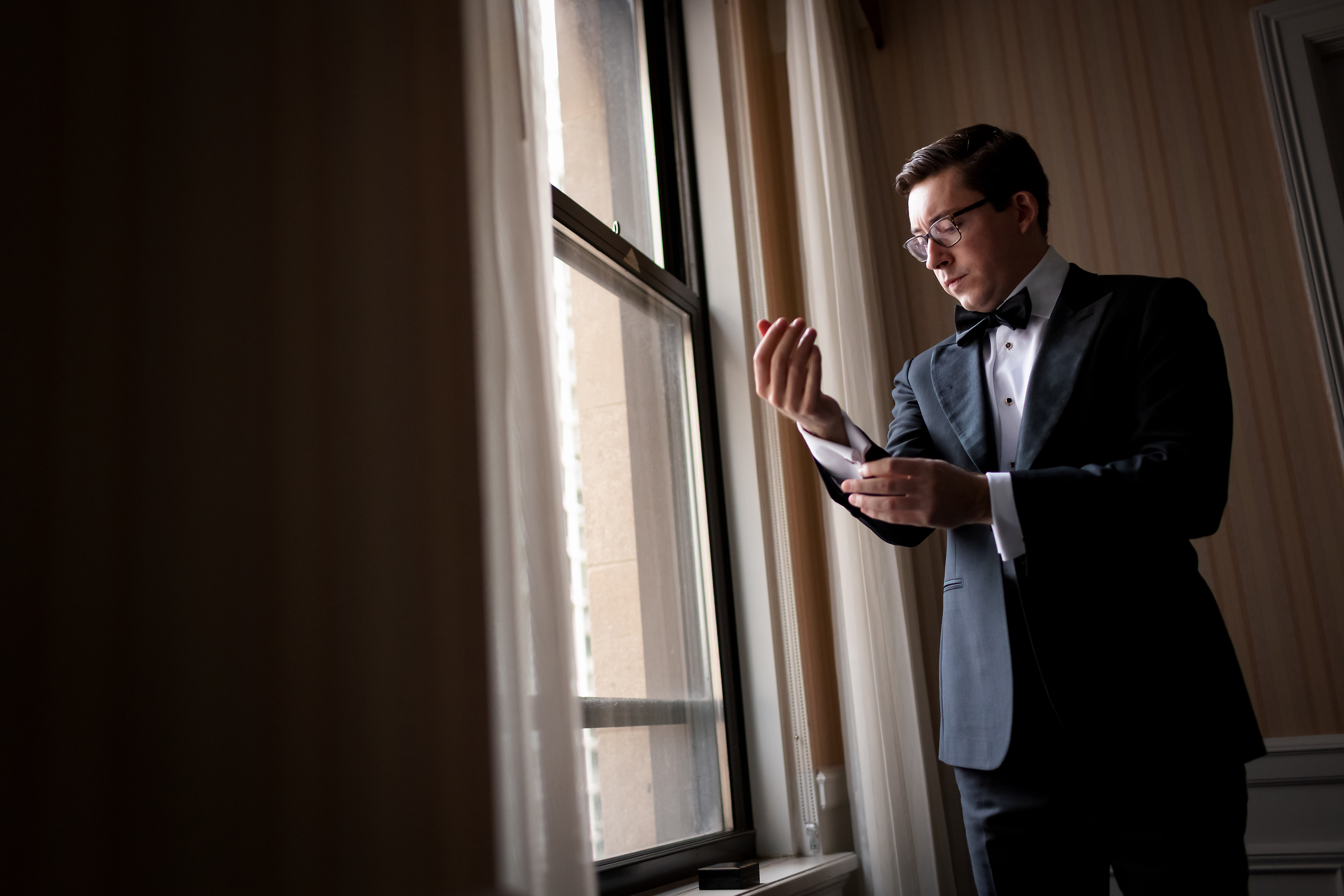 Groom gets ready at The Drake Hotel in Chicago