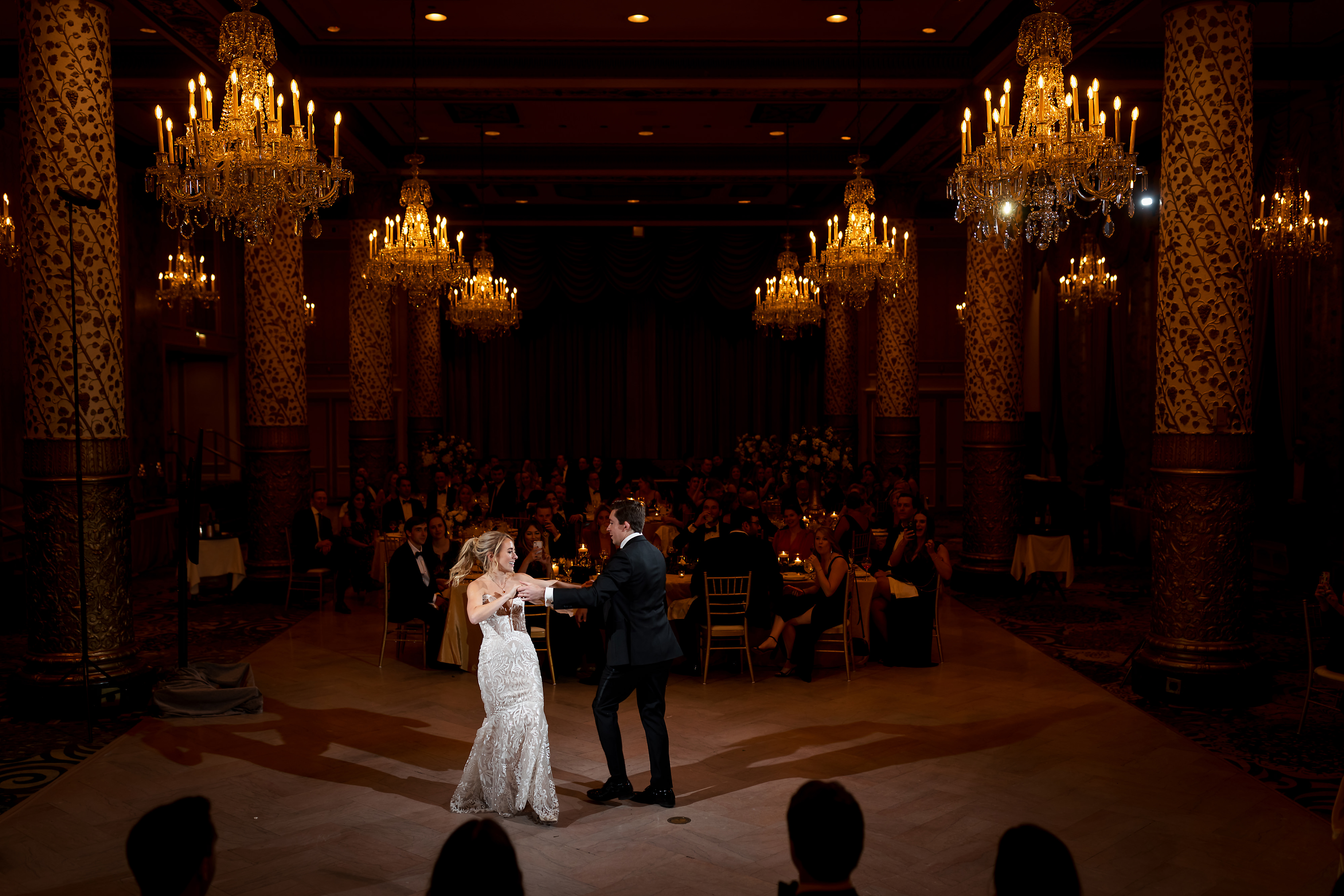 Bride and groom have their first dance during wedding reception in the Grand Ballroom at The Drake Hotel in Chicago