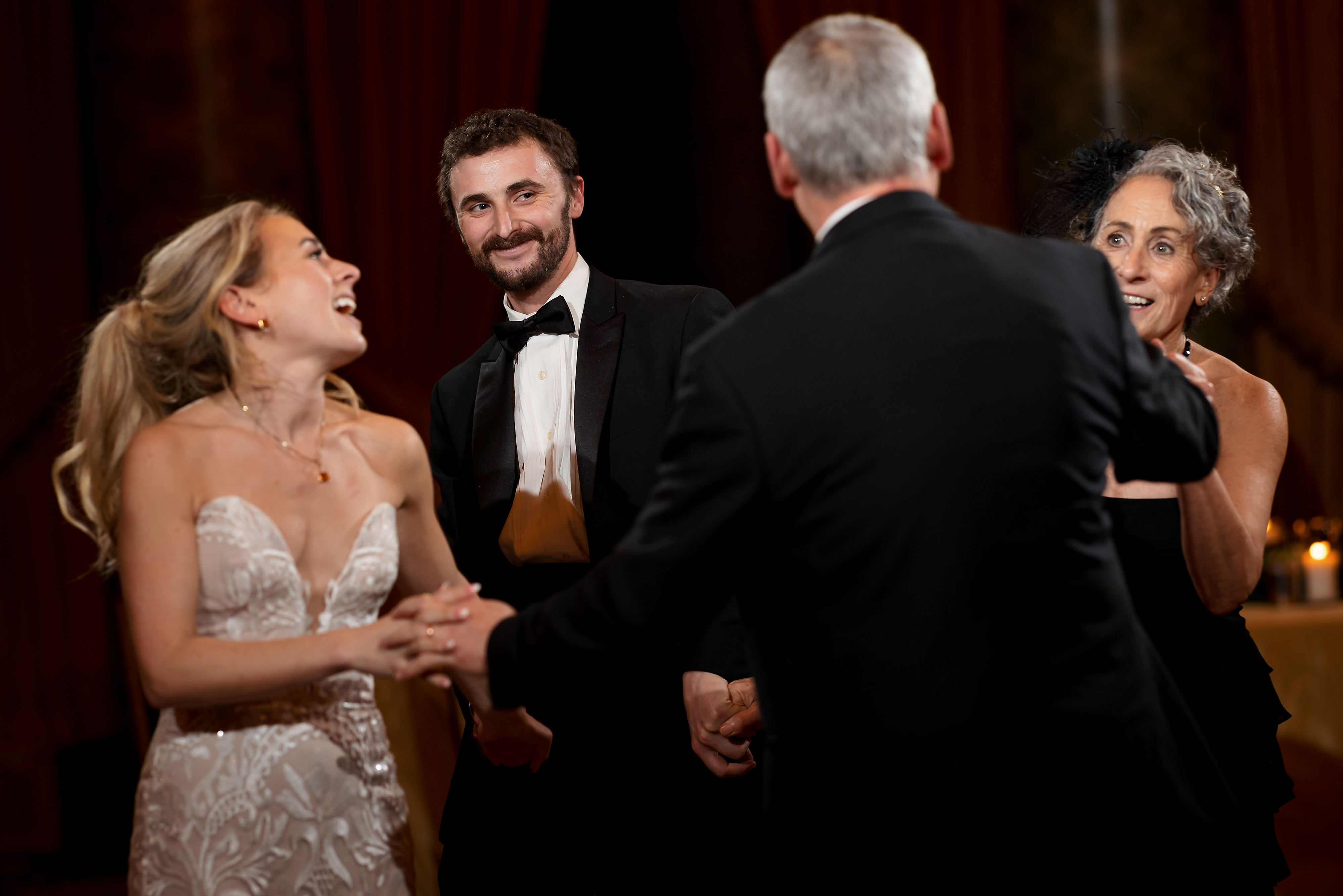 Brides family shares first dance during wedding reception in the Grand Ballroom at The Drake Hotel in Chicago