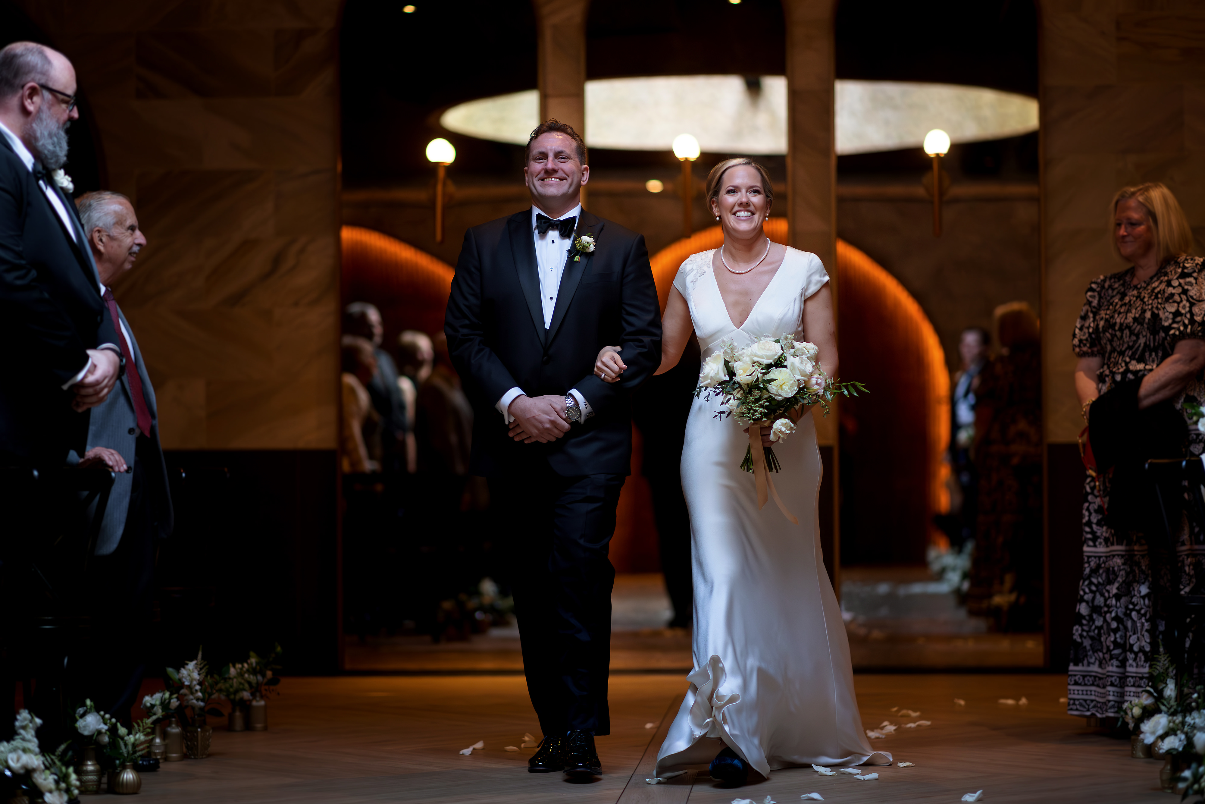 Bride and groom walk down the aisle during wedding ceremony at Chicago Winery