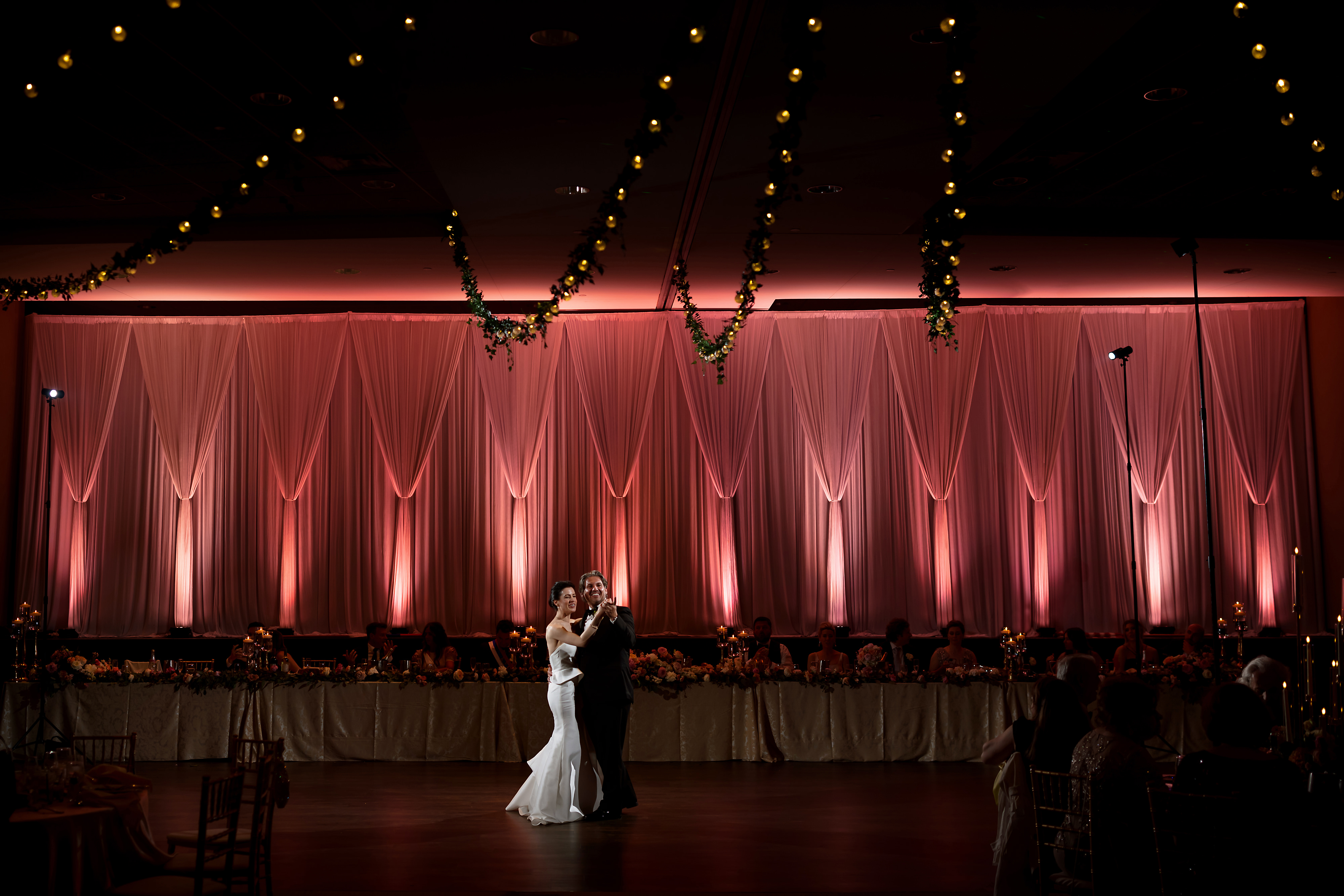 Bride and groom first dance during reception at Halls of St. George