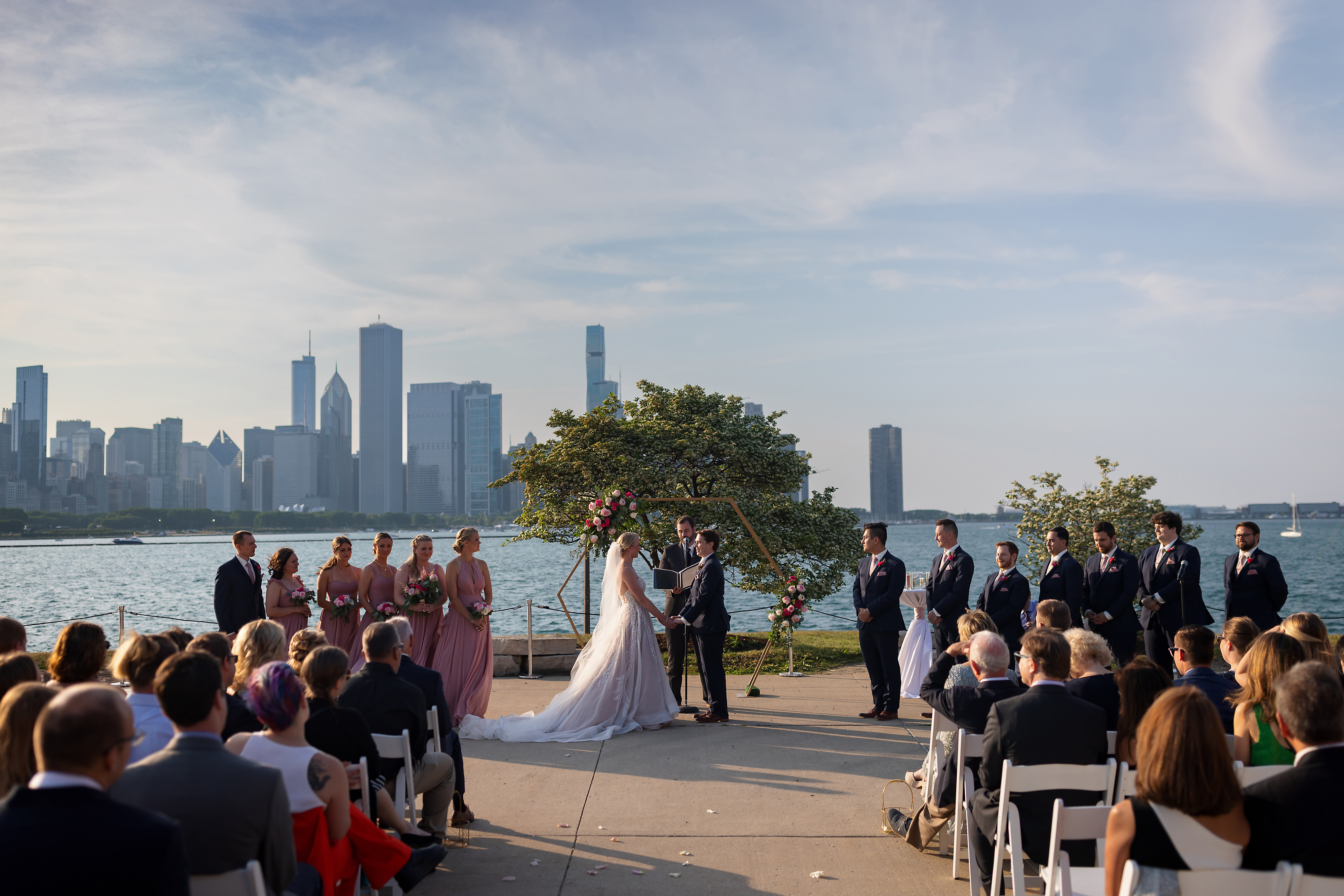 wide angle view of outdoor wedding ceremony at Adler Planetarium in Chicago