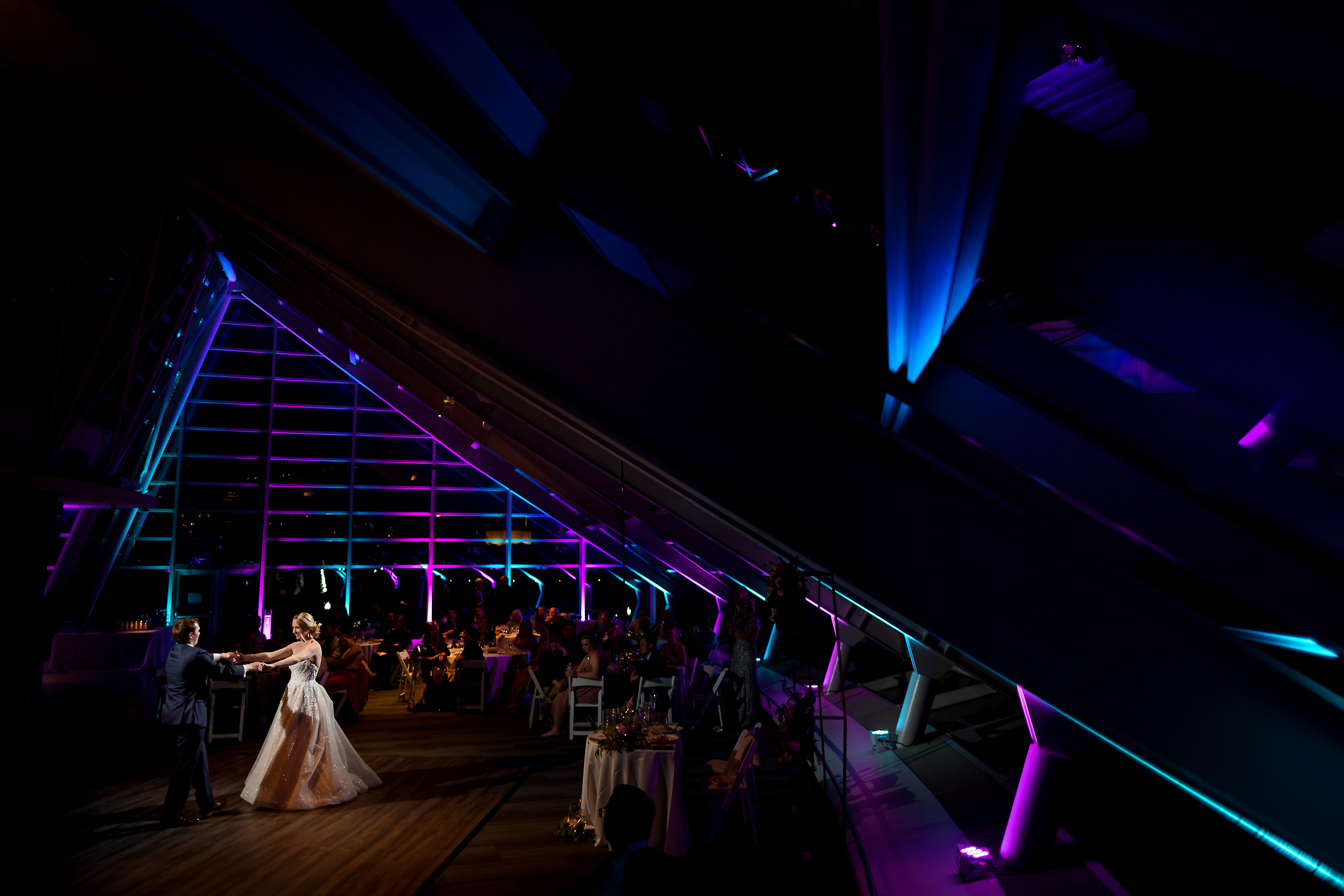 bride and groom first dance during wedding reception at Adler Planetarium in Chicago