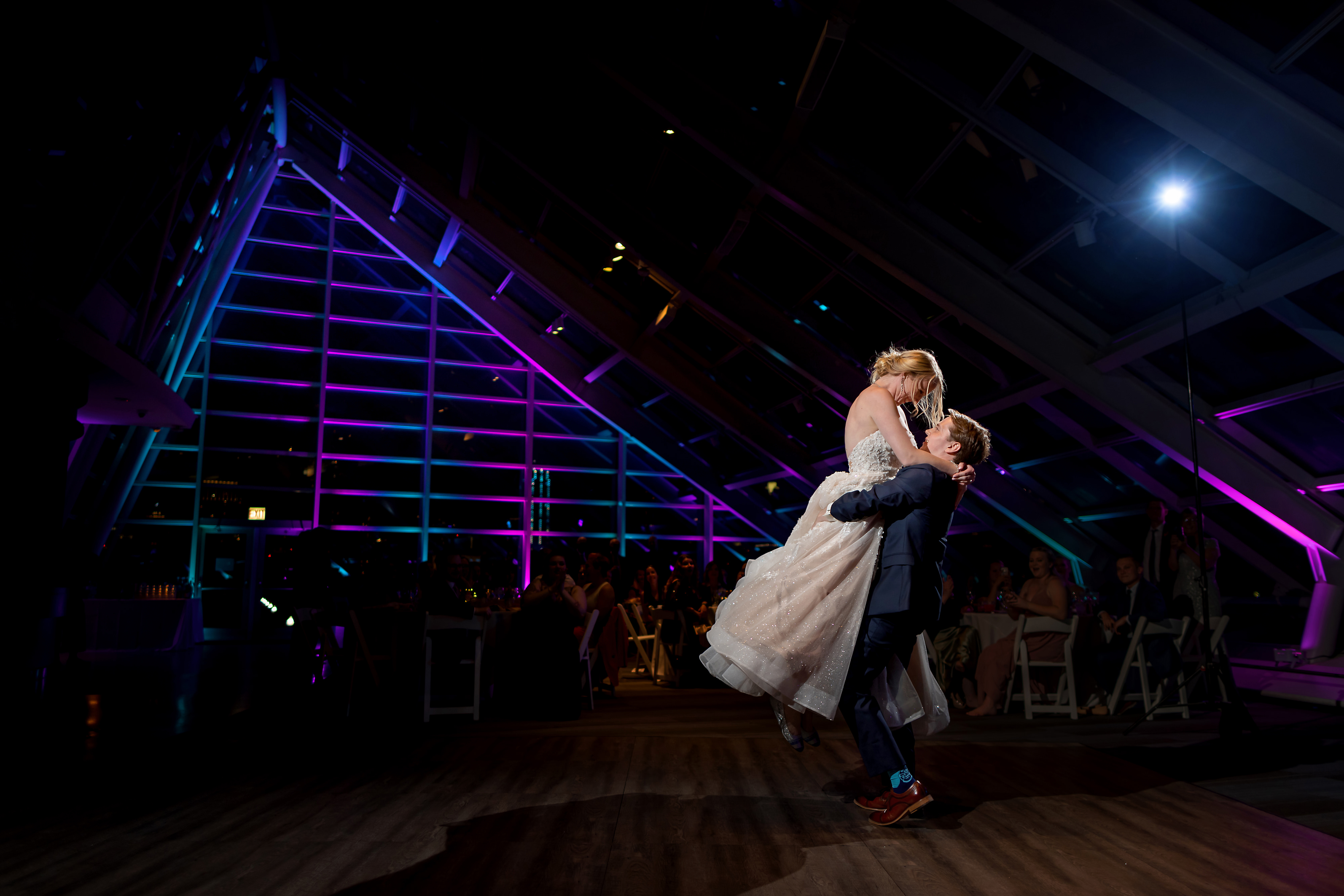 bride and groom first dance during wedding reception at Adler Planetarium in Chicago