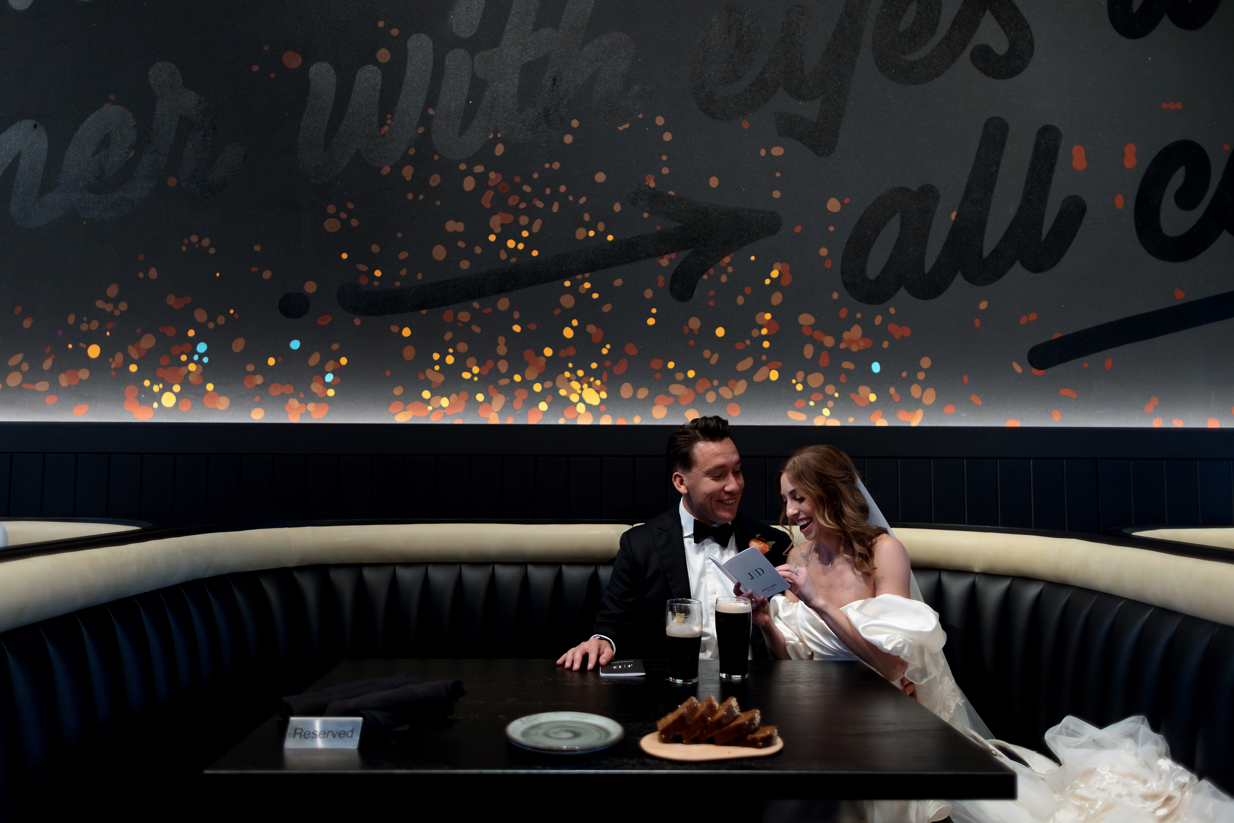 Bride and Groom share vows on their wedding day in booth at Guiness Open Gate Brewery in Chicago's West Loop