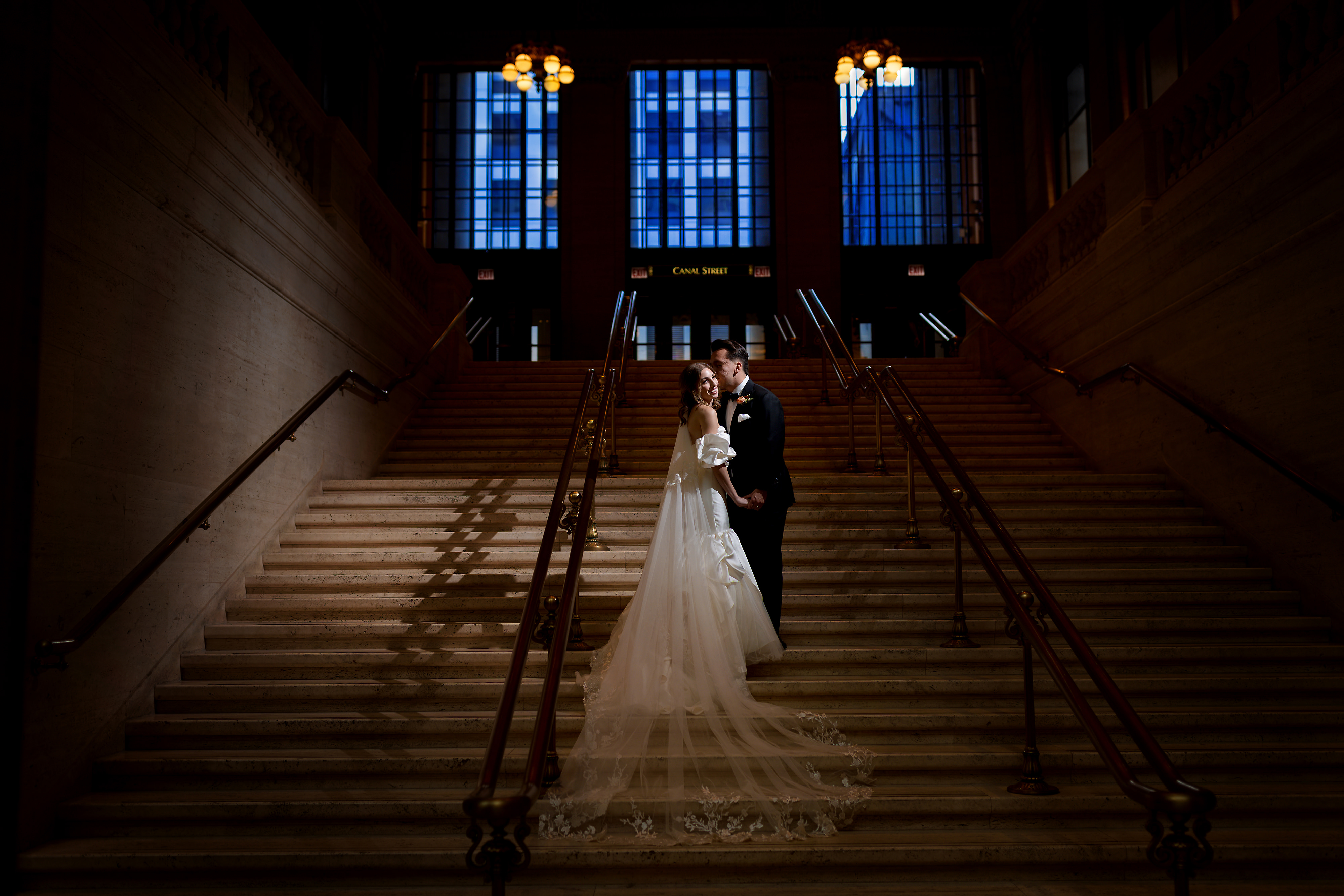 Bride and groom portrait on stairs at Union Station in downtown Chicago