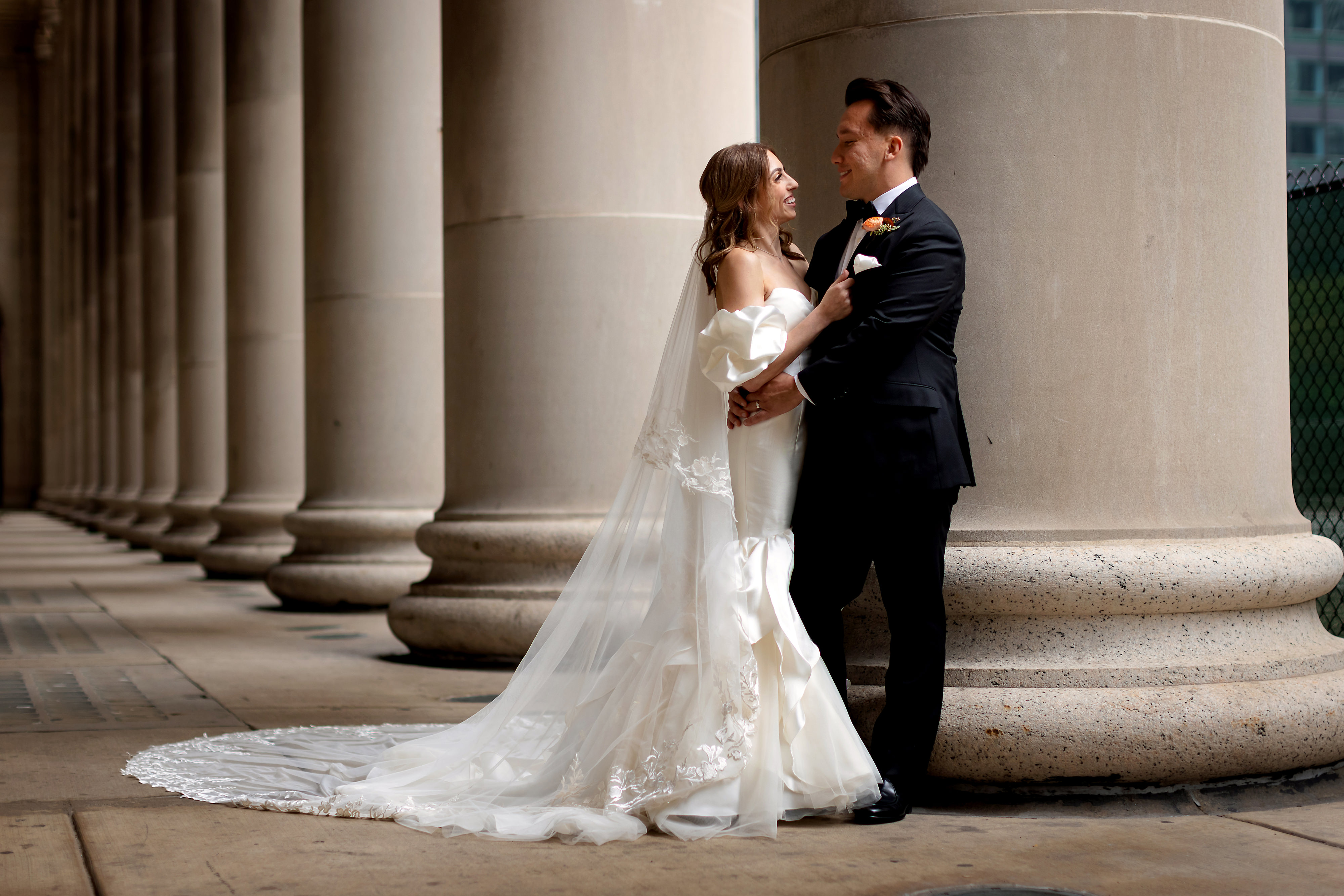Portrait of bride and groom outside of Union Station in Chicago
