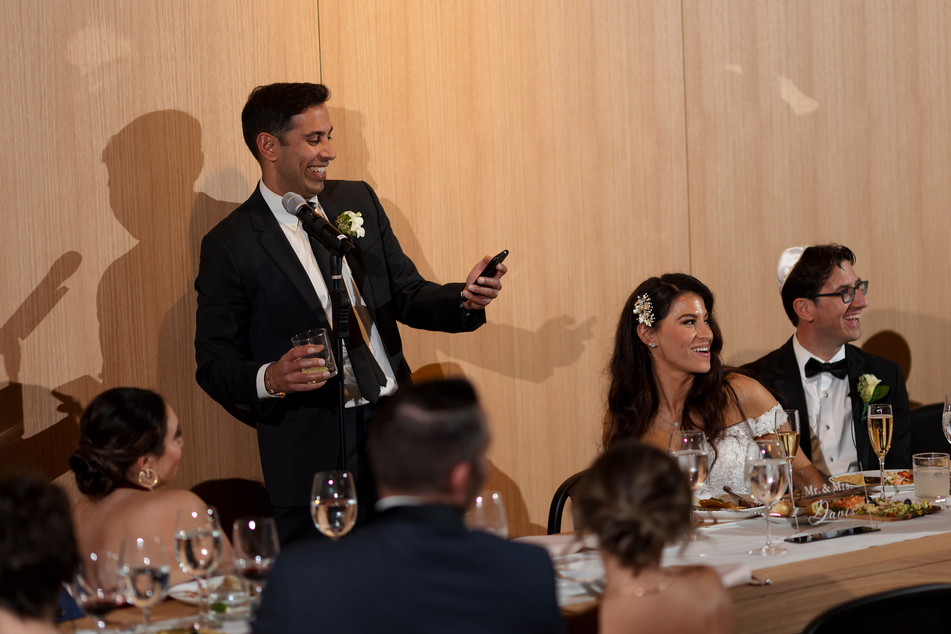 Groomsman gives toast during wedding reception at Sarabande in Chicago